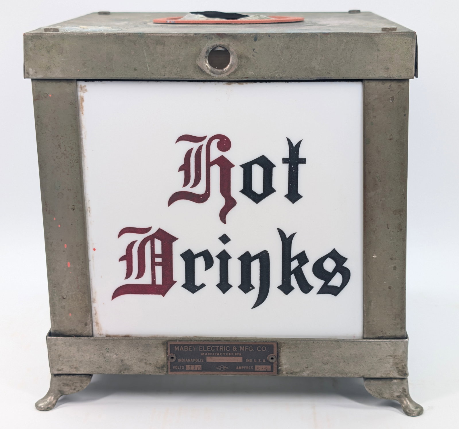 MABEY MFG. CO. HOT DRINKS BASE METAL W/ GLASS PANEL: REMAINS IN FAIR CONDITION, SHOWING USAGE WEAR THROUGHOUT. GLASS PANELS REMAIN NICE.