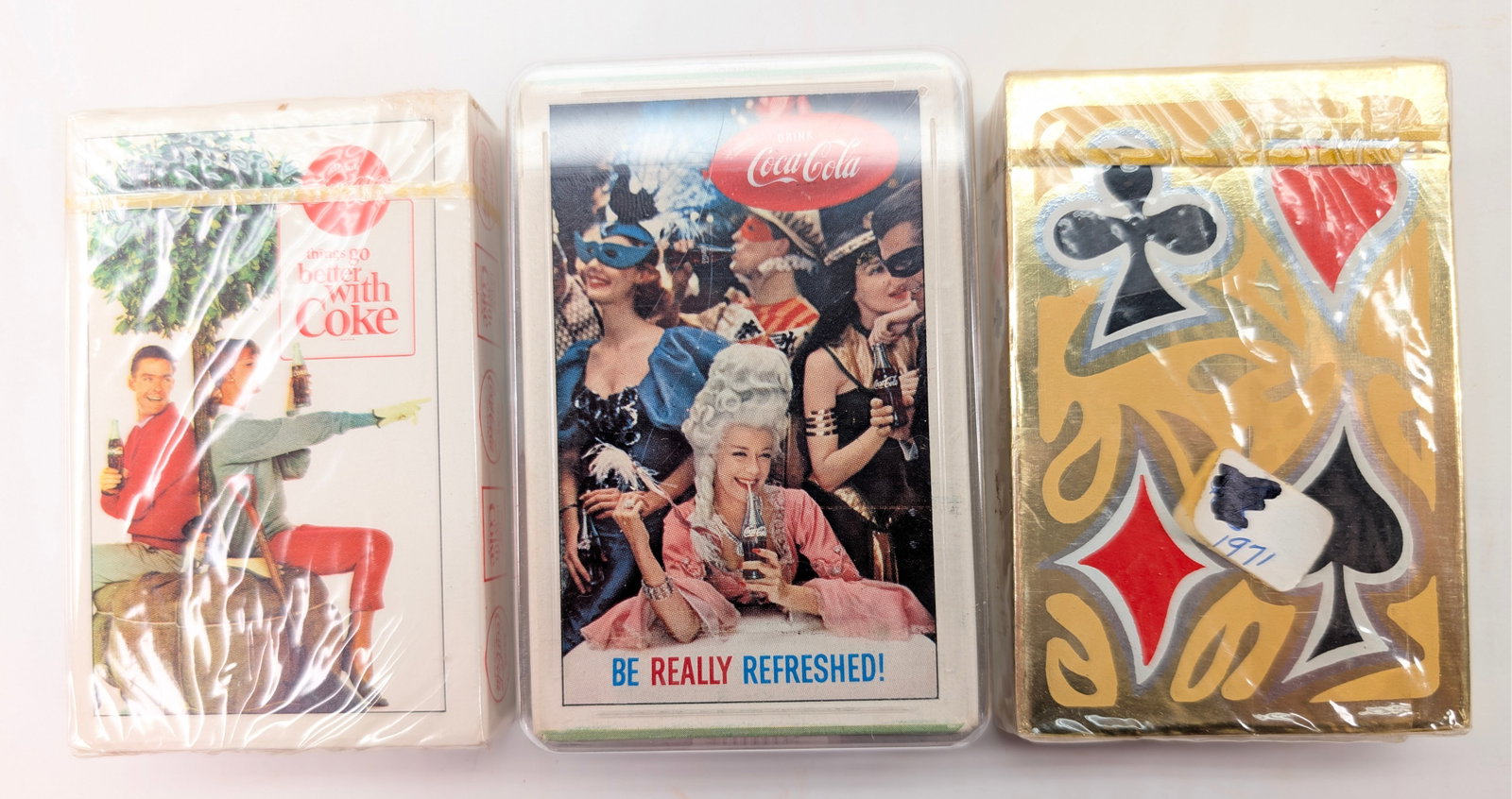 3) UNOPENED PACKS OF COCA COLA PLAYING CARDS: ALL REMAIN IN VERY GOOD CLEAN UNOPENED CONDITION.
