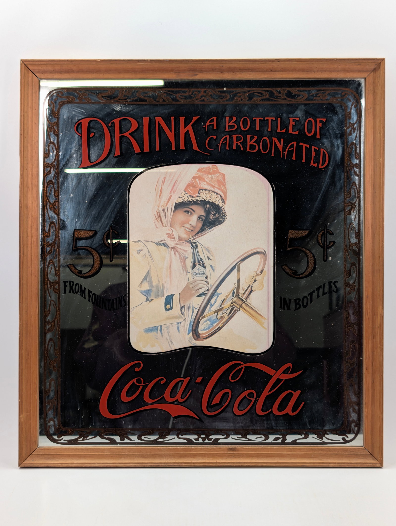 REPRODUCTION COCA COLA GLASS MIRROR: REMAINS IN GOOD CONDITION, SHOWING SOME LIGHT WEAR.