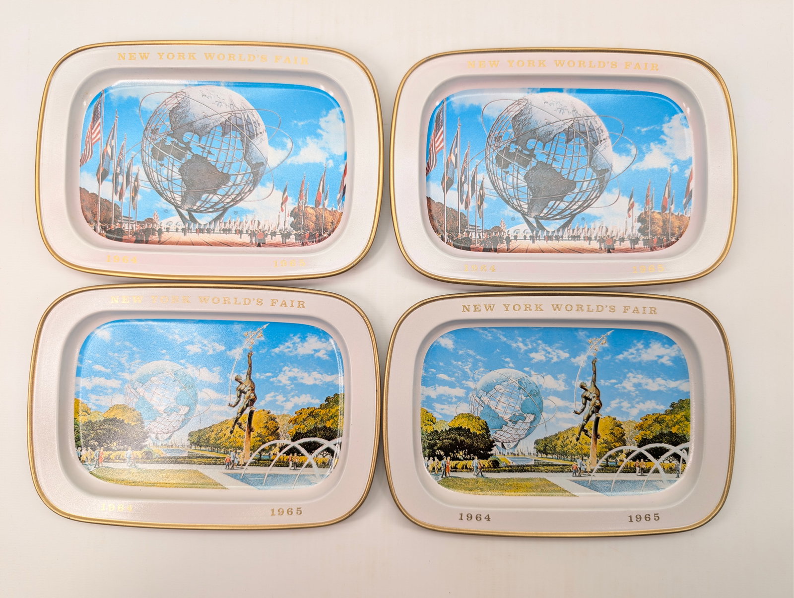4) VINTAGE NY WORLDS FAIR METAL TRAYS: ALL REMAIN IN GOOD CLEAN CONDITION.
