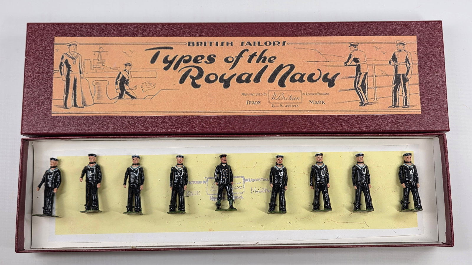 VINTAGE BRITAIN 1510 BRITISH SAILORS REGULATION DRESS MARCHING: SET REMAINS IN GOOD CONDITION, SHOWING SOME TYPICAL PAINT WEAR. CUSTOM BOX.