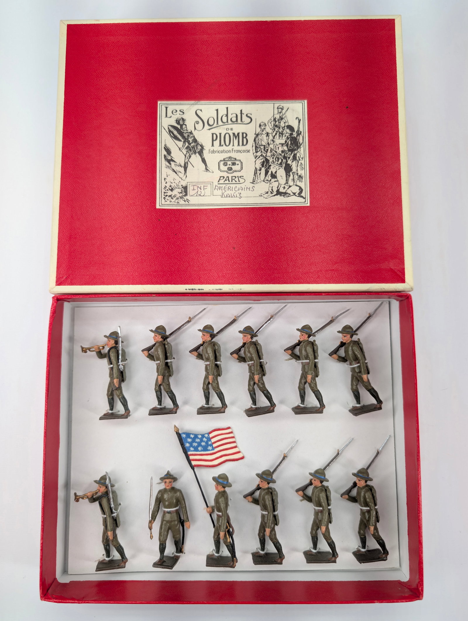 C.B.G. MIGNOT AMERICAN KHAKIS MARCHING: SET REMAINS IN VERY GOOD CLEAN CONDITION WITH BOX.
