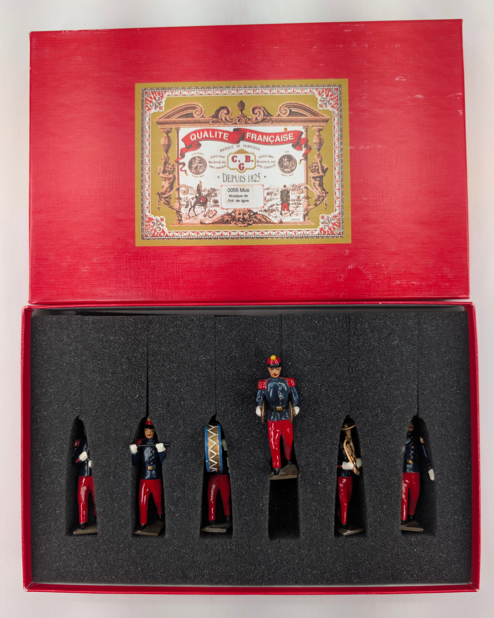 C.B.G. MIGNOT INFANTRY BAND: SET REMAINS IN GOOD CONDITION, SHOWING SOME LIGHT TYPICAL WEAR.