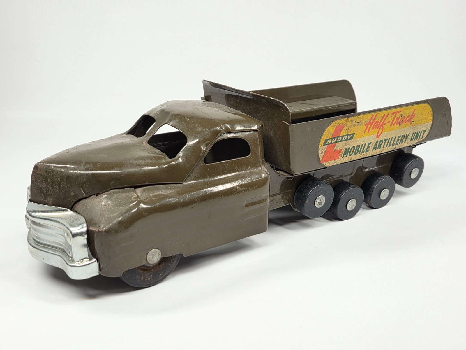 BUDDY L PRESSED STEEL MOBIL ARTILLERY UNIT HALF TRACK: REMAINS IN FAIR TO GOOD CONDITION, SHOWING SOME TYPICAL WEAR. REPLACED FRONT BUMPER.