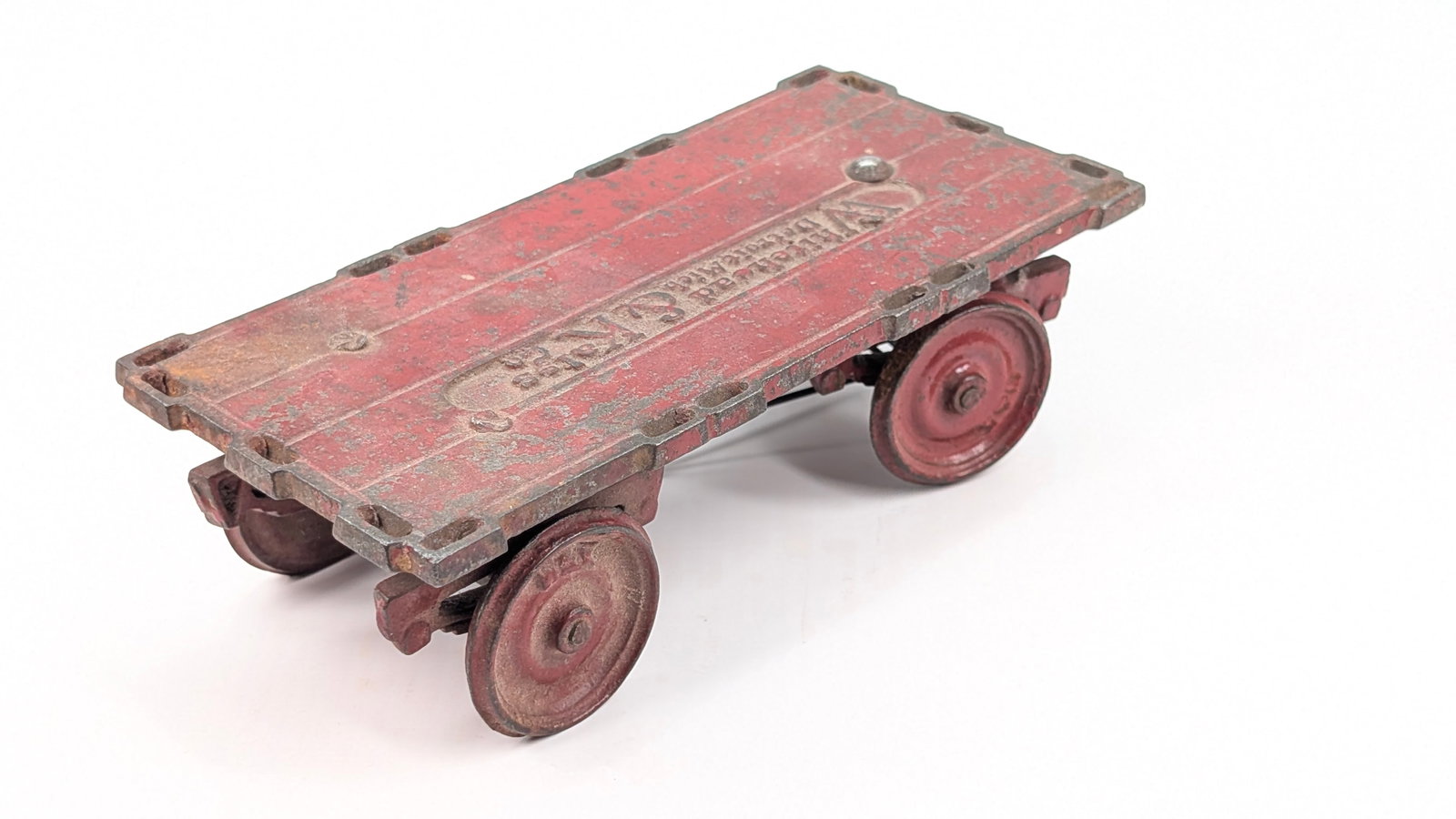 ARCADE CAST IRON WHITEHEAD & KALES WAGON: REMAINS IN FAIR CONDITION, SHOWING PAINT WEAR THROUGHOUT. MISSING THE STAKES.