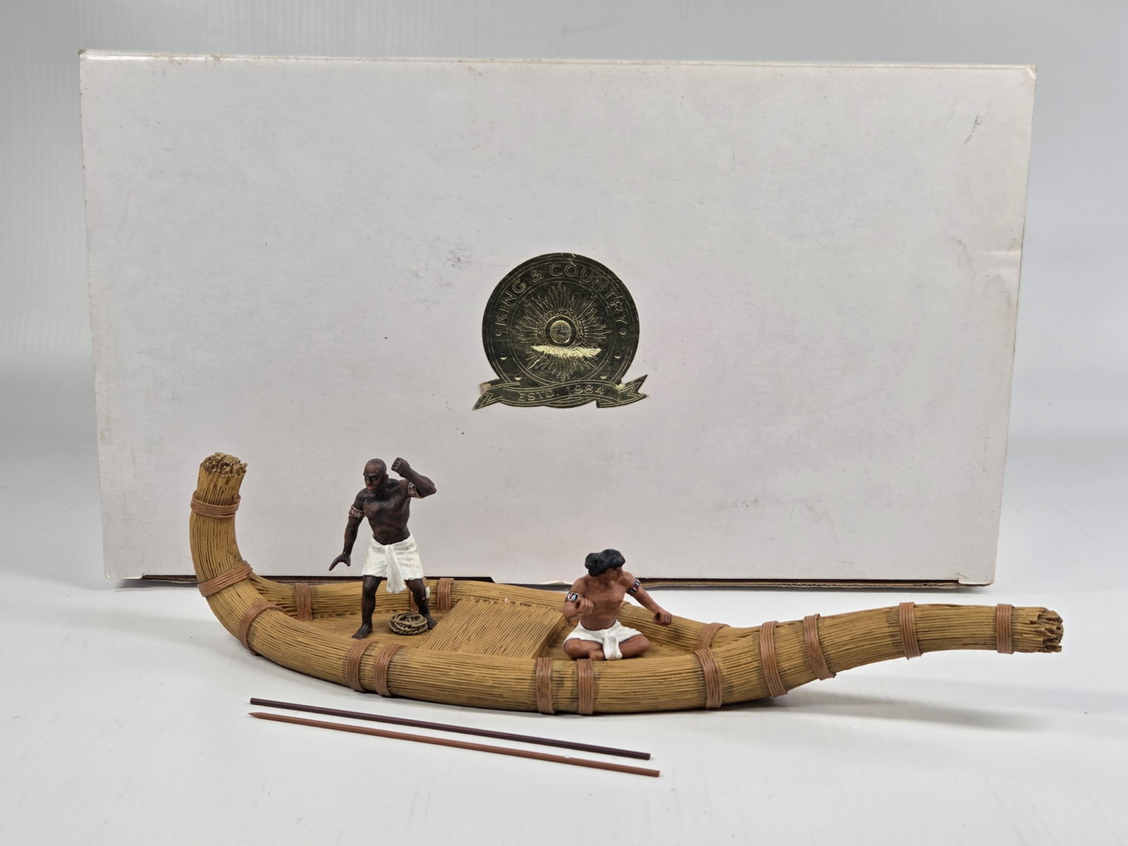 KING & COUNTRY HUNTING THE HIPPO PAPYRUS BOAT: REMAINS IN VERY GOOD CONDITION, SHOWING LIGHT DISPLAY WEAR. BOX SHOWING STORAGE WEAR.