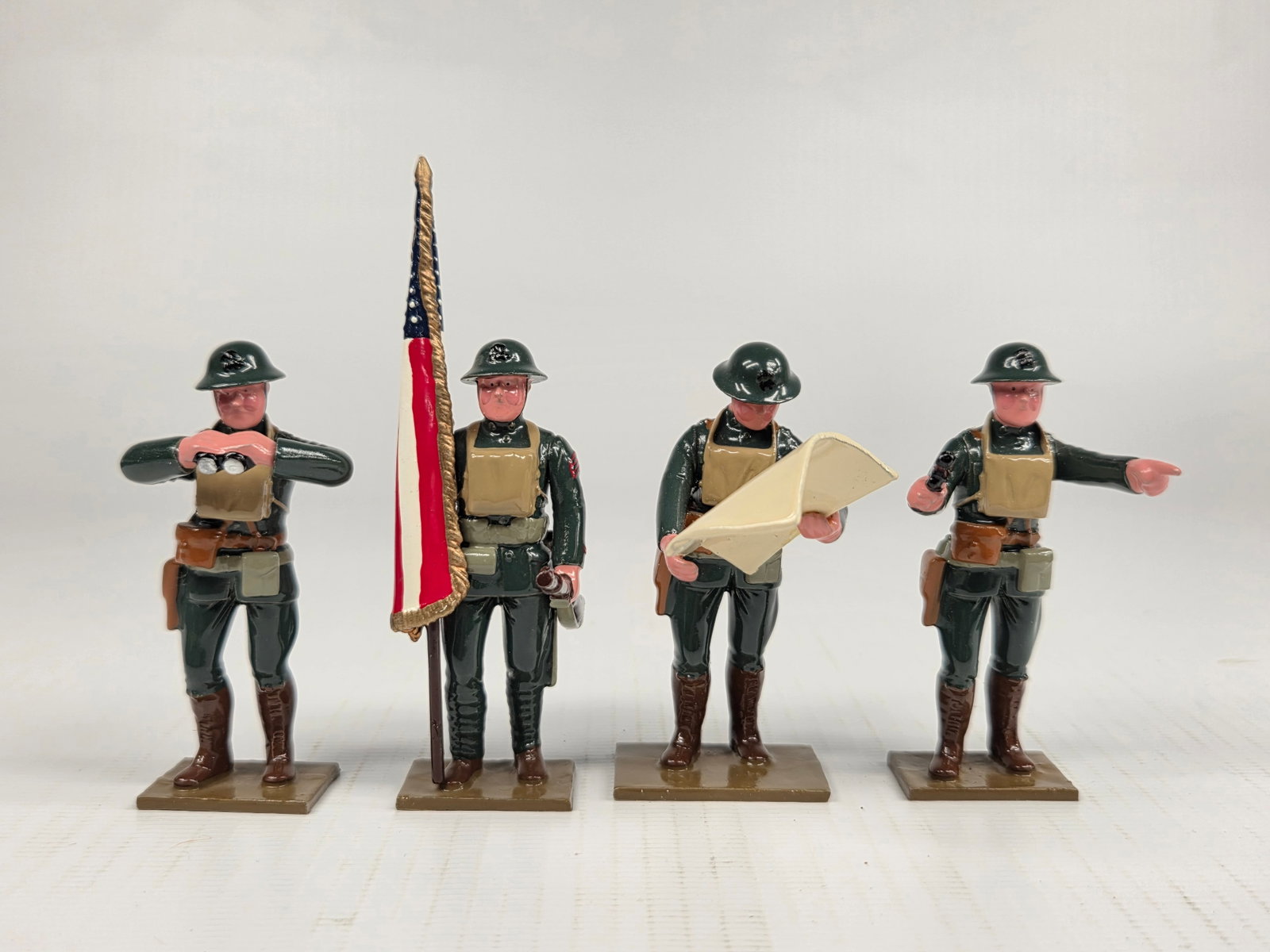 SET OF 4 SOLDIERS OF THE WORLD US DOUGHBOY: ALL REMAIN IN VERY GOOD CLEAN CONDITION.