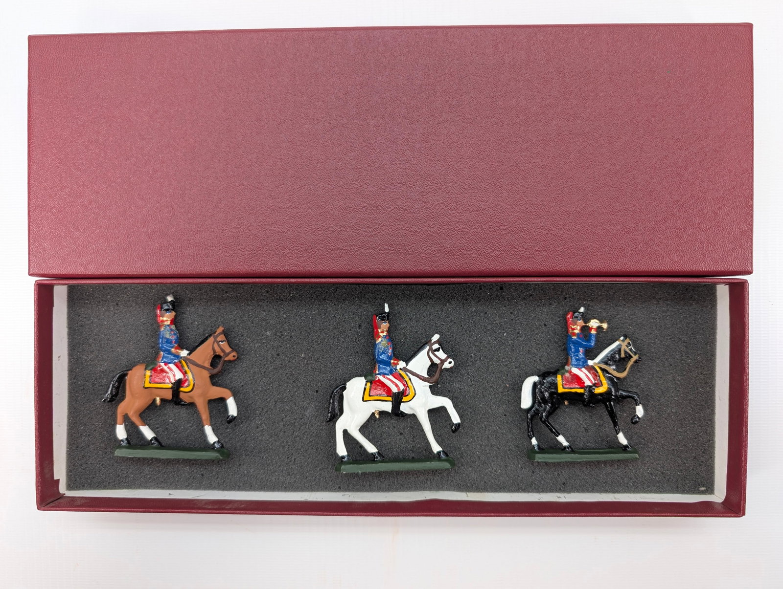 AMBASSADOR HAND PAINTED CAVALRY SOLDIERS SET: SET REMAINS IN GOOD CONDITION, SHOWING SOME TYPICAL WEAR. CUSTOM BOX.