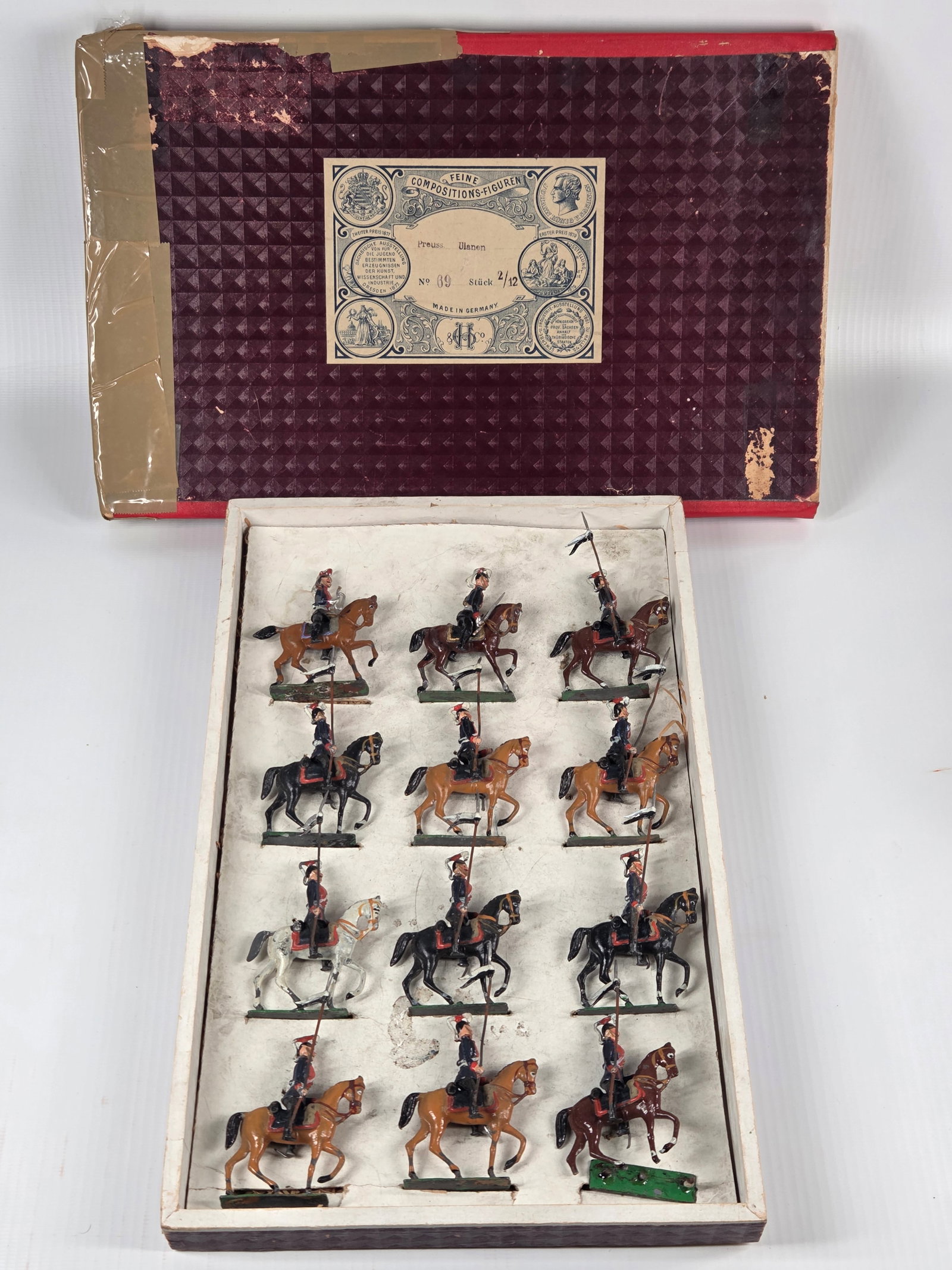 GEORG HEYDE PRUSSIAN ULANEN CAVALRY SET: DAMAGED BOX - SET REMAINS IN GOOD CONDITION, SHOWING SOME TYPICAL WEAR.