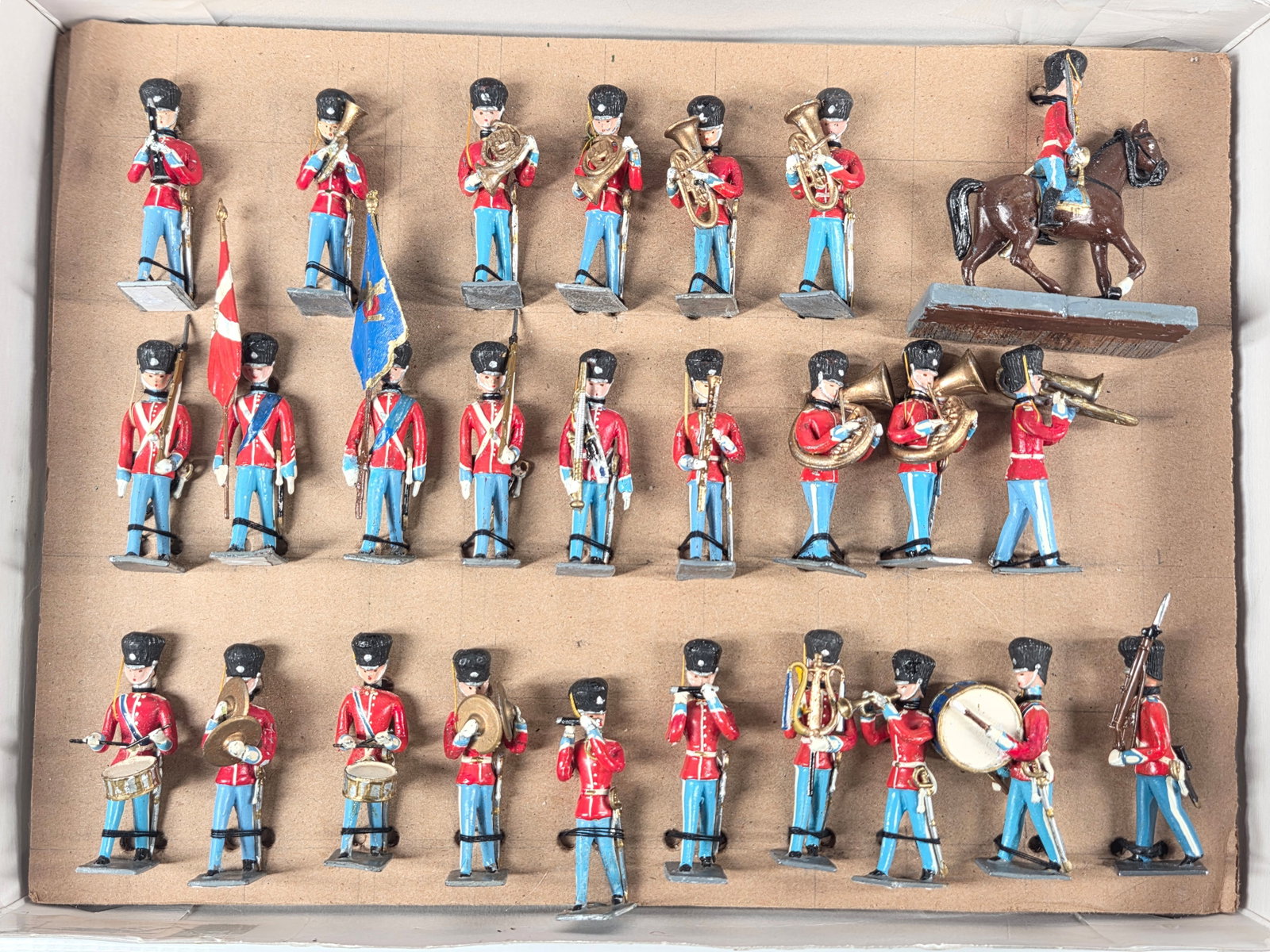 HAND PAINTED BRITISH MILITARY BAND SET: SET REMAINS IN GOOD CONDITION, SHOWING SOME TYPICAL WEAR.