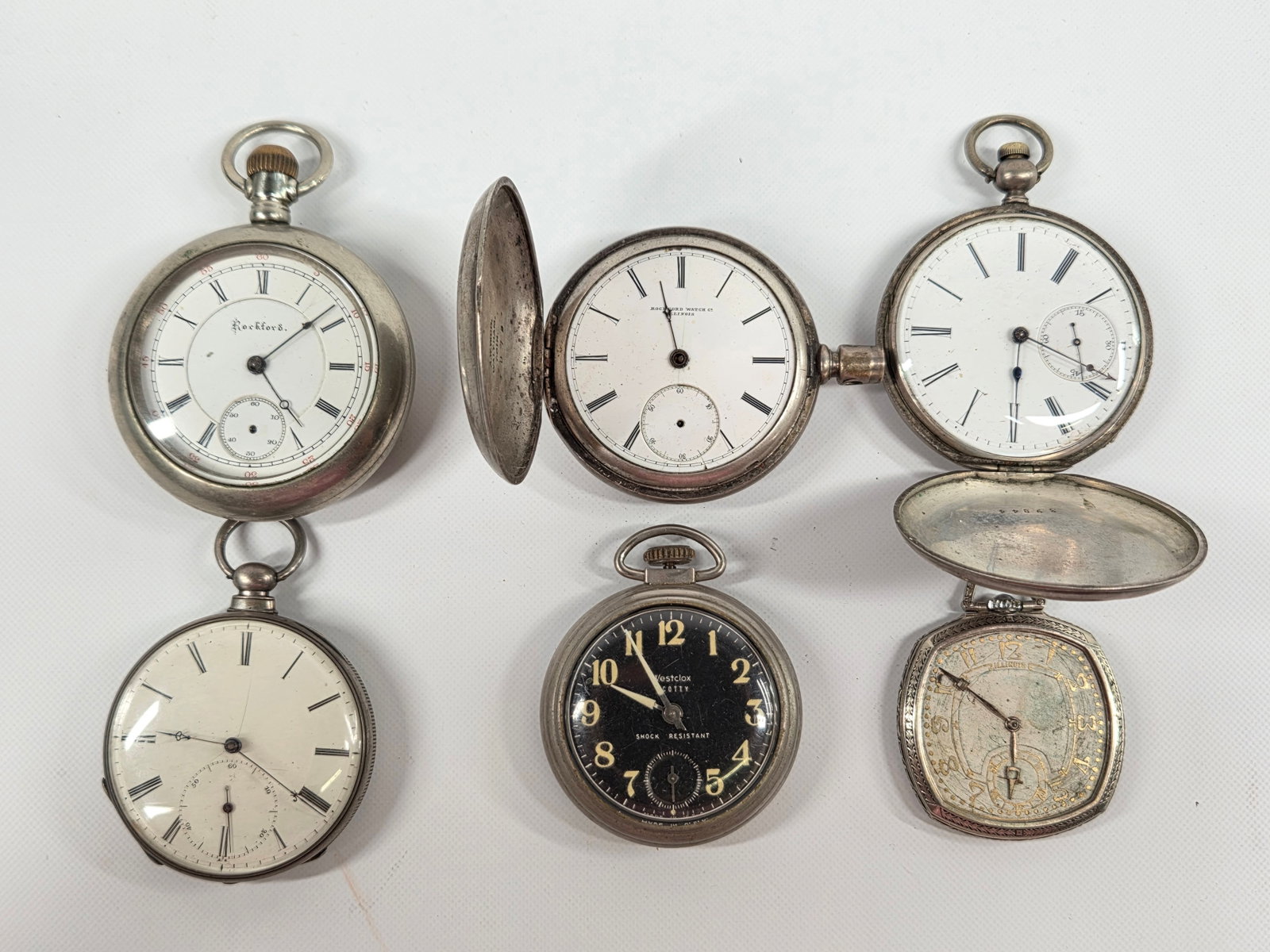 6) VARIOUS BRAND ANTIQUE POCKET WATCHES: ALL REMAIN IN FAIR TO GOOD CONDITION, SHOWING SOME TYPICAL WEAR. CURRENTLY NOT IN RUNNING ORDER.