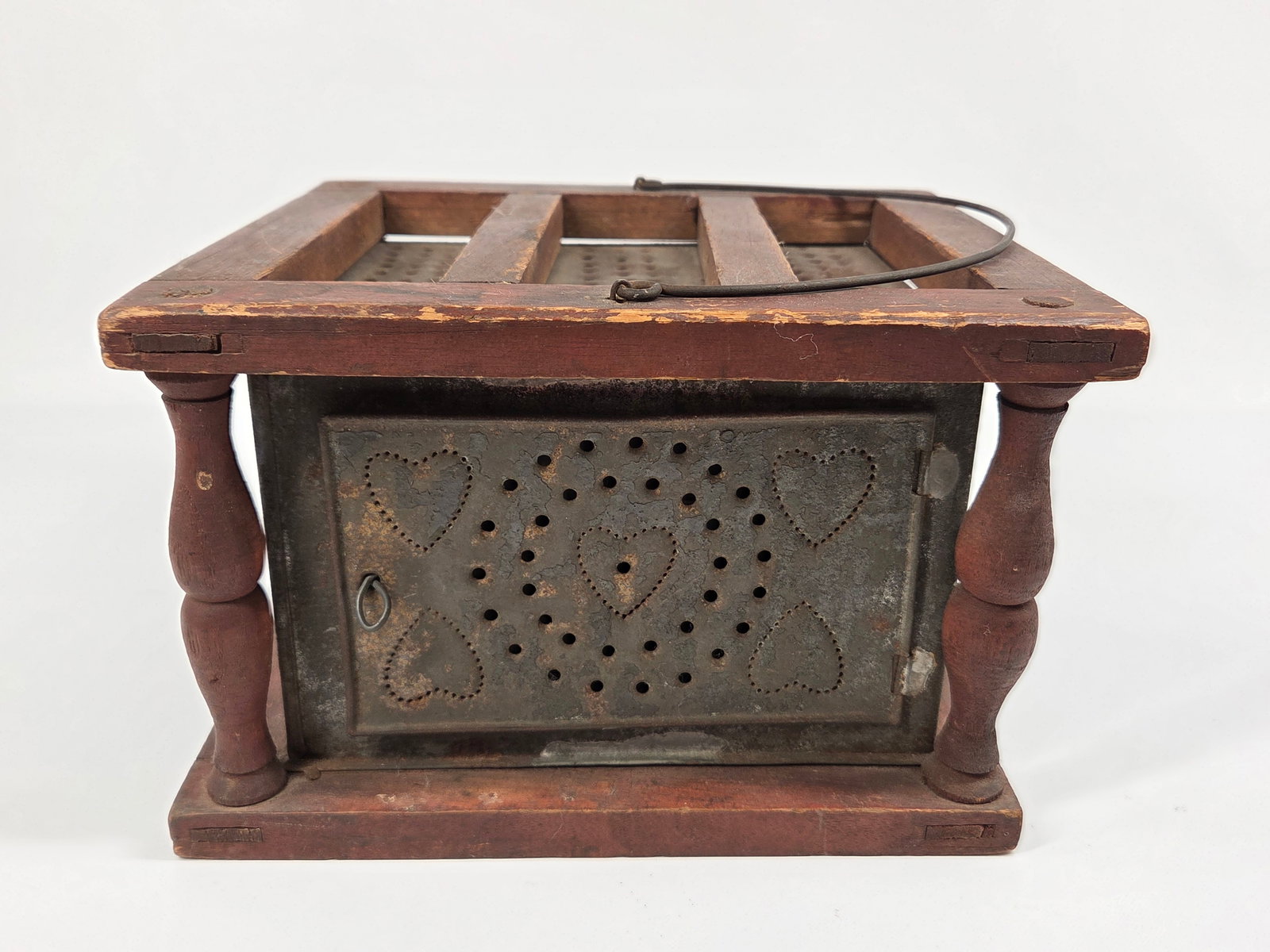 ANTIQUE PAINTED WOOD AND PUNCH TIN WARMER: REMAINS IN FAIR TO GOOD CONDITIO, SHOWING TYPICAL USAGE WEAR.
