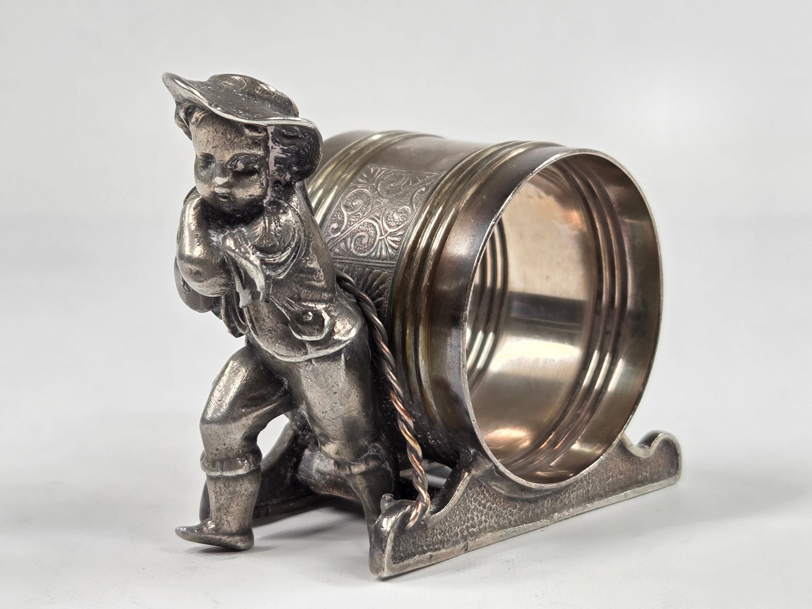 VICTORIAN ERA SILVERPLATE NAPKIN RING - CHILD PULLING SLEIGH (1 of 7)