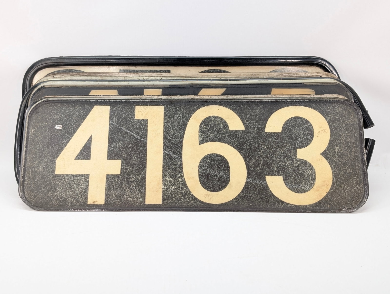 ASSORTMENT OF FIBERGLASS NUMBER SIGNS: AL REMAIN IN FAIR USED CONDITION, SHOWING WEAR.