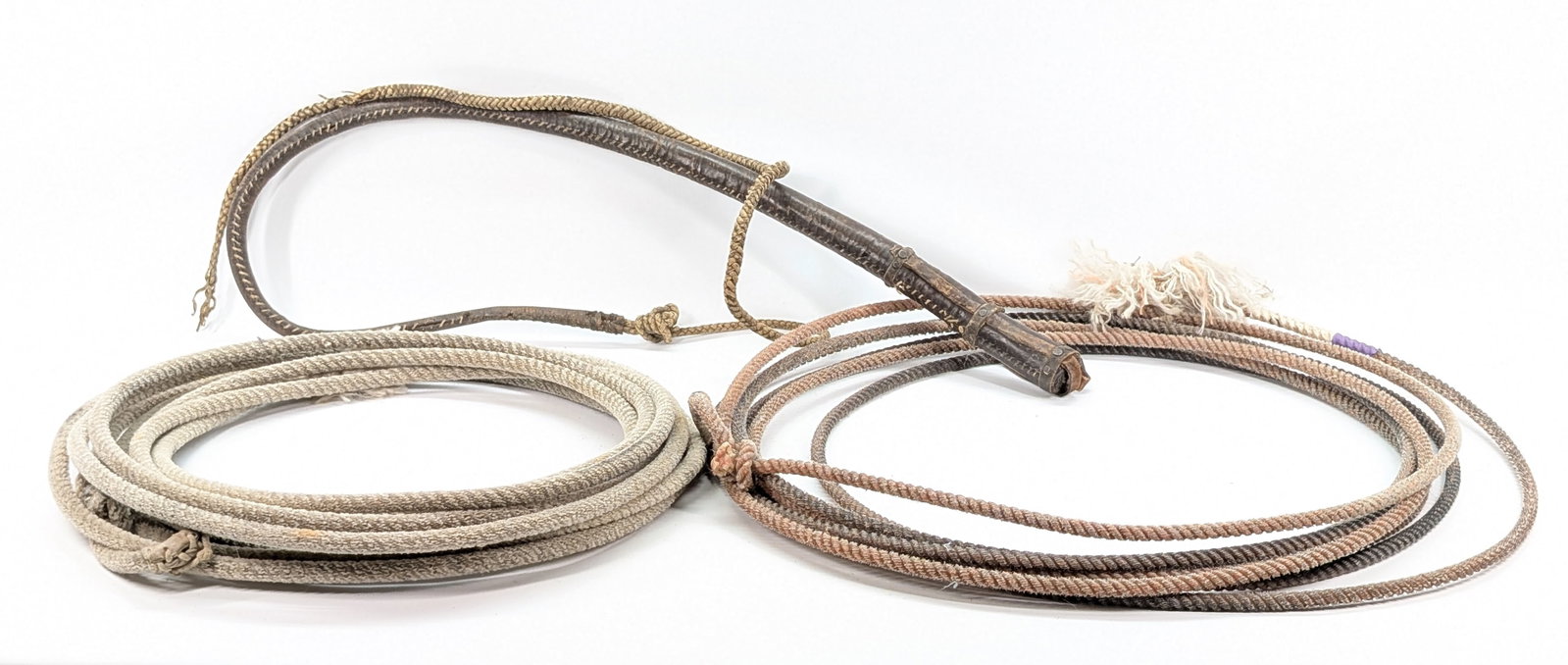 VARIOUS LASSO & WHIPS: ALL REMAIN IN GOOD CONDITION, SHOWING SOME TYPICAL WEAR.