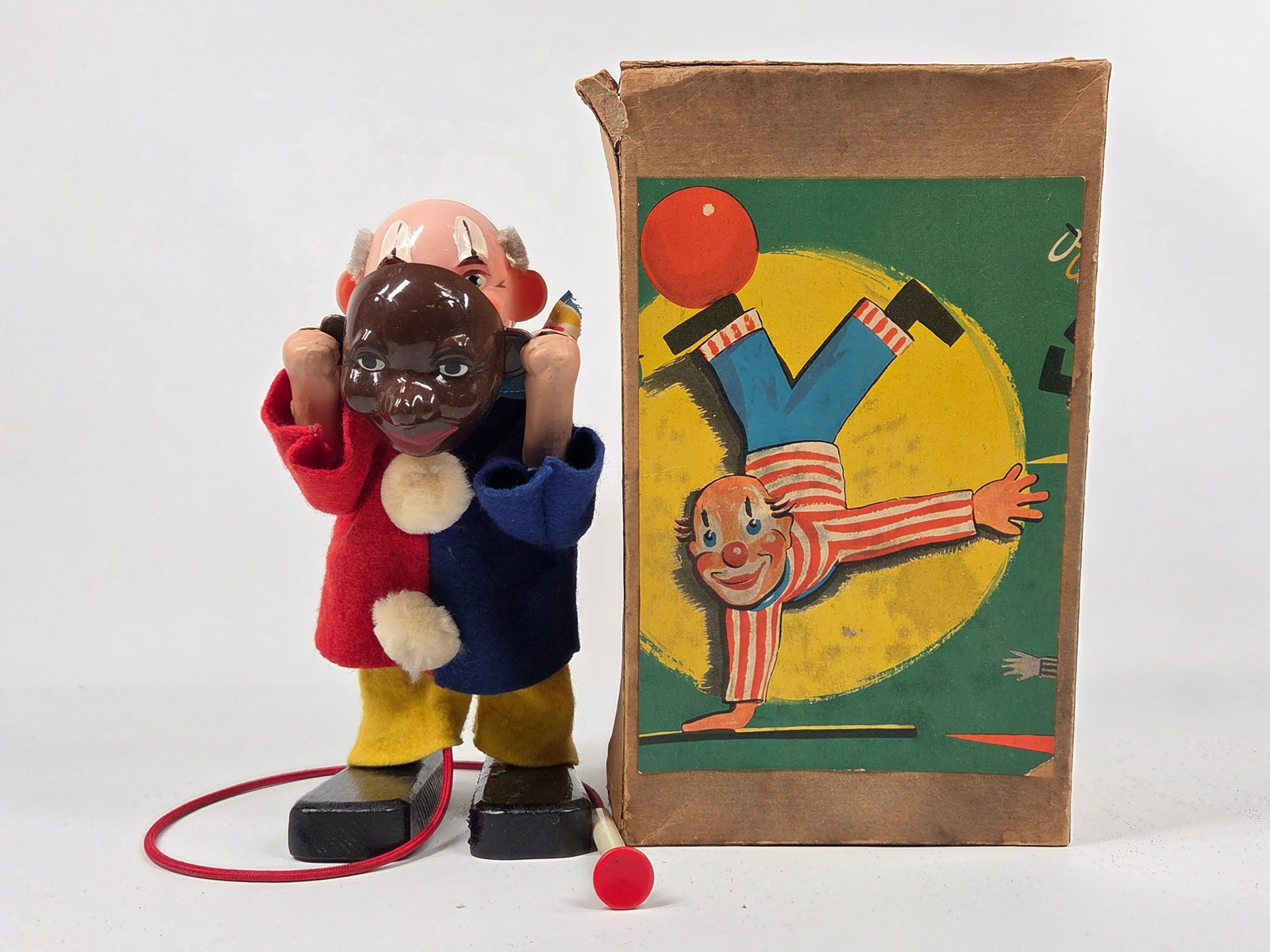 VINTAGE PUSH ACTION CLOWN W/ MASK IN BOX (1 of 7)