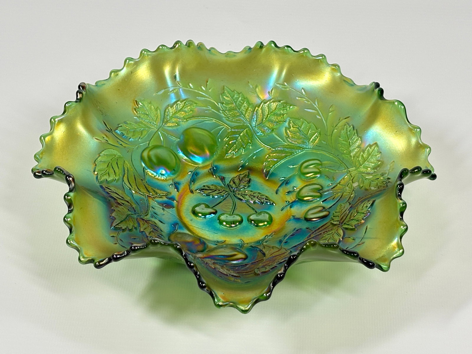 NORTHWOOD EMERALD THREE FRUITS BOWL: REMAINS IN VERY GOOD CONDITION, NO CHIPS OR CRACKS.