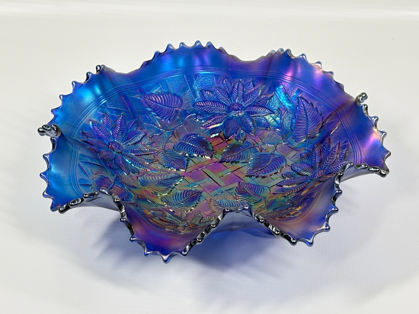 ELECTRIC BLUE NORTHWOOD POINSETTIA & LATTICE FOOTED BOWL: REMAINS IN VERY GOOD CONDITION, NO CHIPS OR CRACKS.