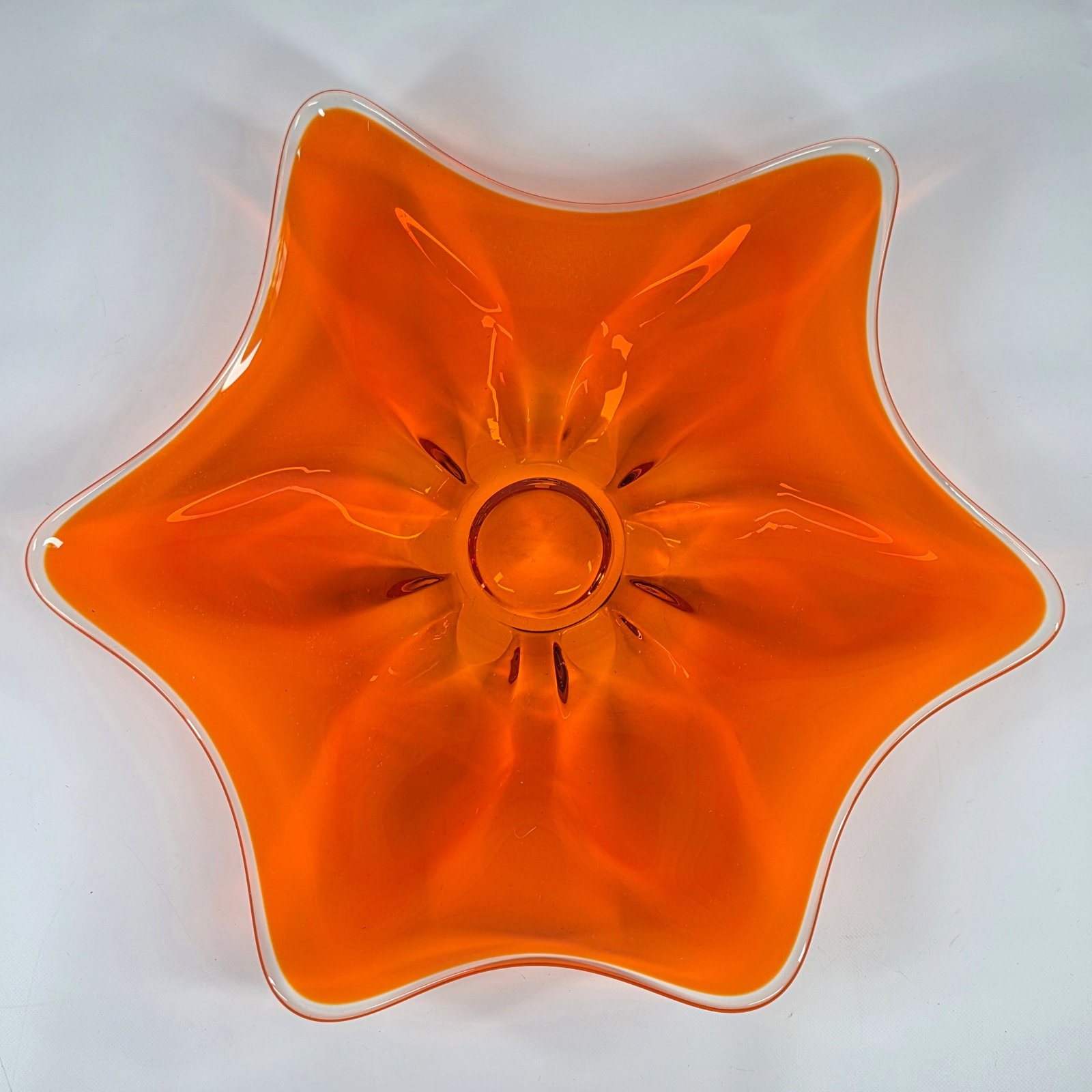 MCM ORANGE GLASS STAR FLOWER PETAL DISH: REMAINS IN VERY GOOD CLEAN CONDITION. NO CHIPS OR CRACKS.