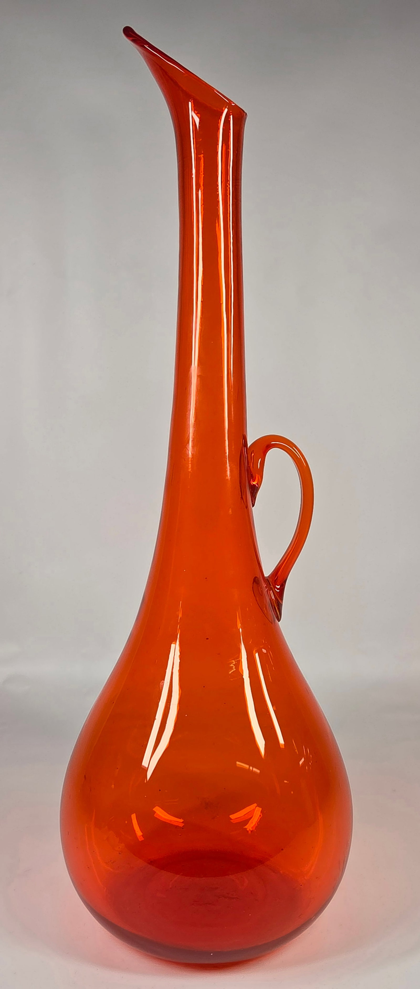 LARGE ORANGE BLOWN GLASS EWER PITCHER VASE: REMAINS IN VERY GOOD CLEAN CONDITION. NO CHIPS OR CRACKS.