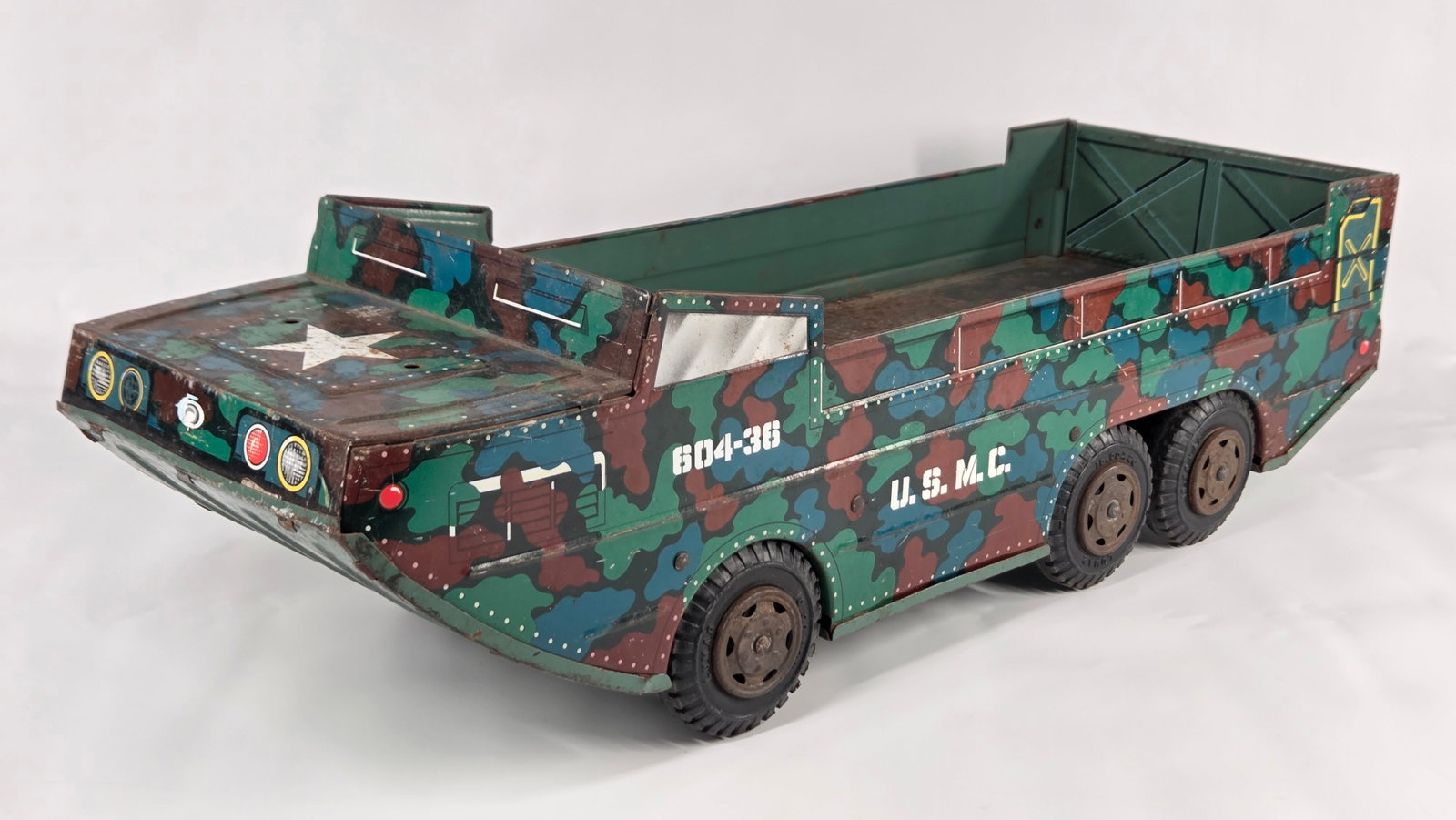 LUMAR MARX PRESSED STEEL AMPHIBIOUS USMC DUCK: REMAINS IN FAIR TO GOOD CONDITION, SHOWING SOME TYPICAL USAGE WEAR AND SOME RUST.