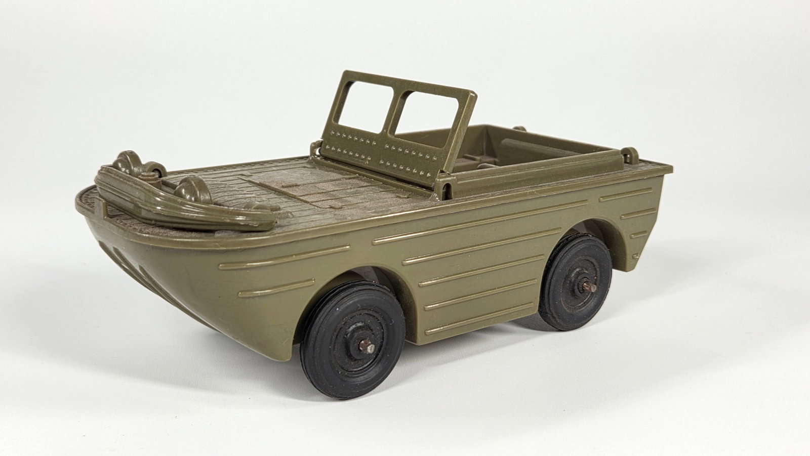 IDEAL PLASTIC US ARMY AMPHIBIOUS DUCK: REMAINS IN GOOD CONDITION. DUSTY, NEEDING CLEANED.