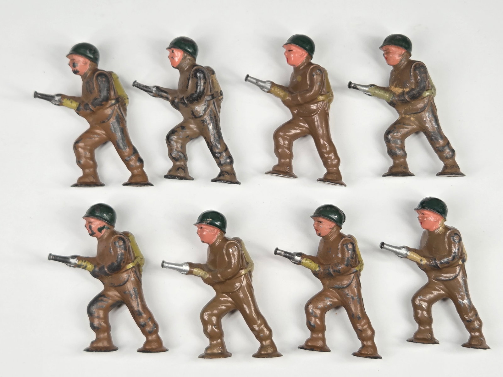 8) BARCLAY MANOIL LEAD POD FOOT SOLDIERS: ALL REMAIN IN FAIR TO GOOD CONDITION, SHOWING PAINT WEAR.