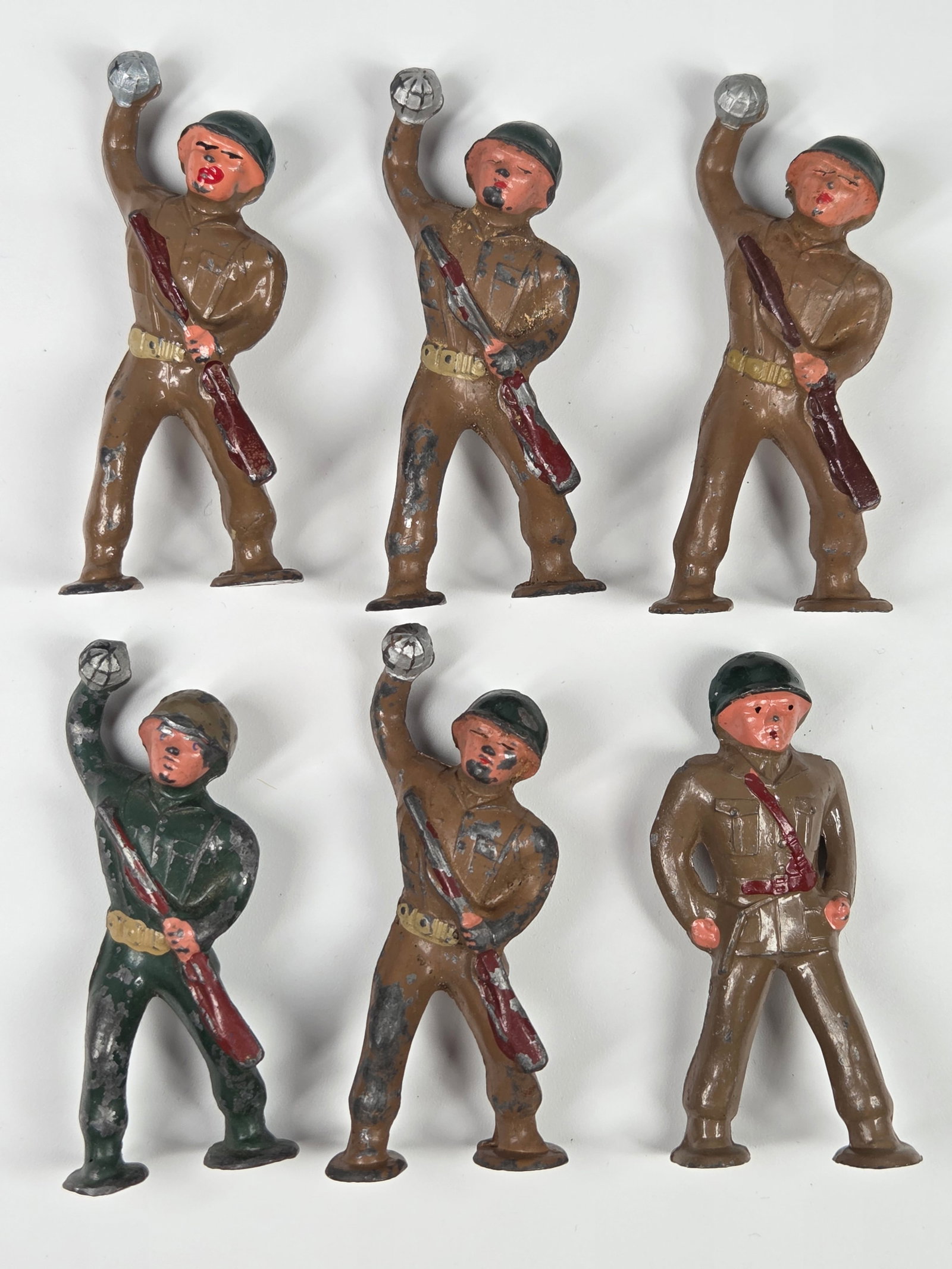 6) BARCLAY MANOIL LEAD POD FOOT SOLDIERS: ALL REMAIN IN FAIR TO GOOD CONDITION, SHOWING PAINT WEAR.