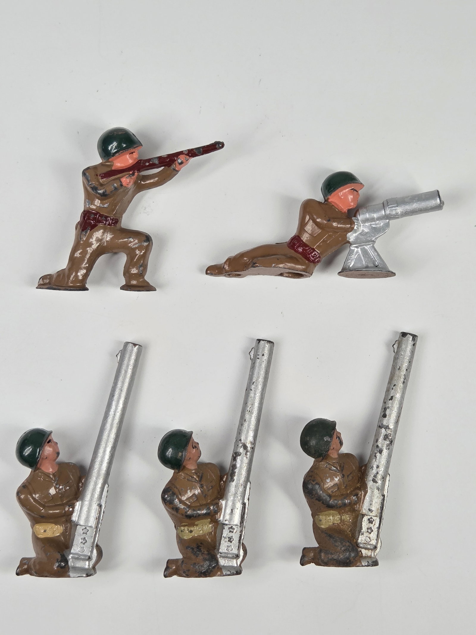 5) BARCLAY MANOIL LEAD SOLDIERS: ALL REMAIN IN FAIR TO GOOD CONDITION, SHOWING PAINT WEAR.