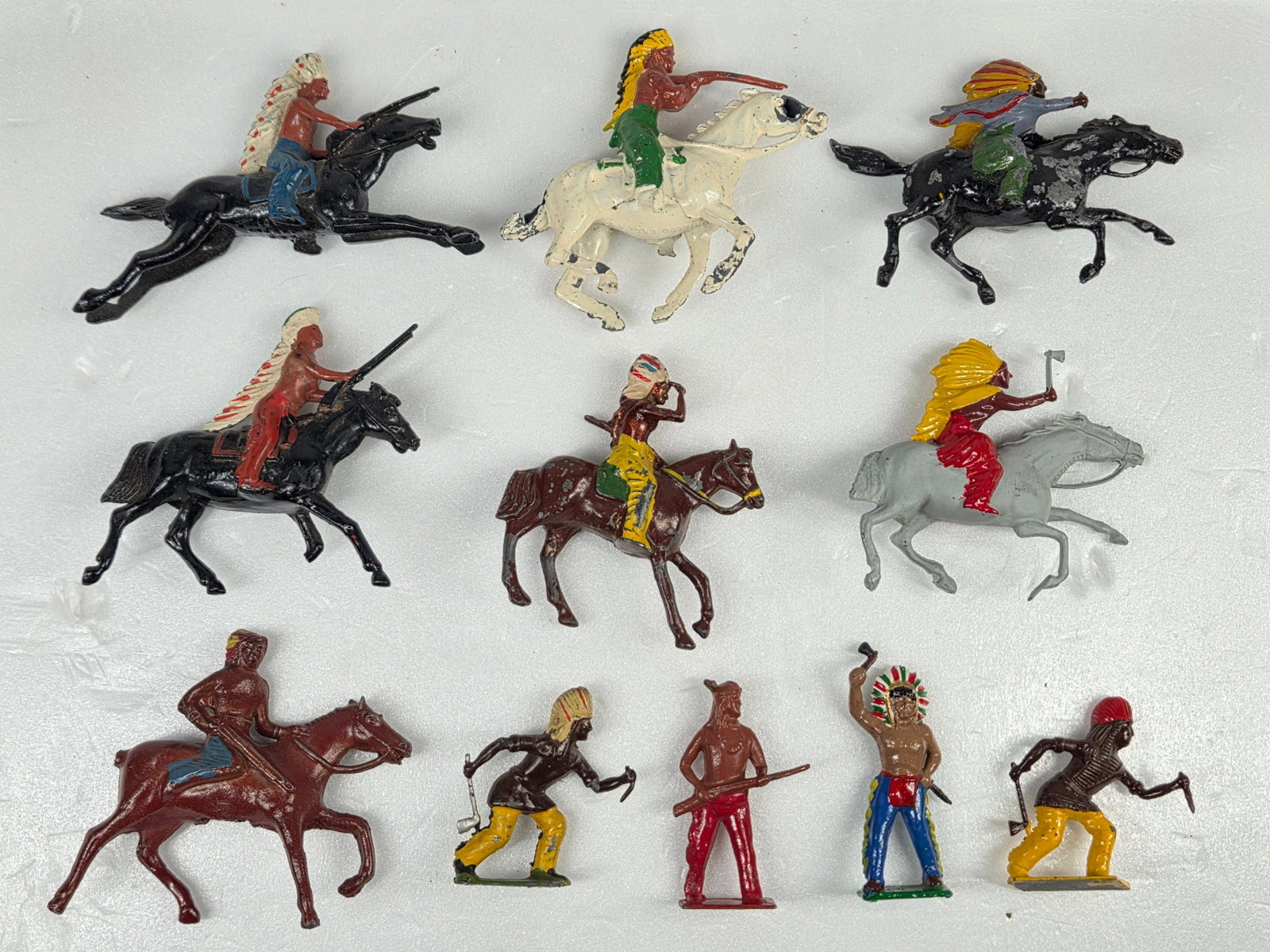 ASSORTED JOHILLCO LEAD PAINTED INDIANS HORSEBACK: ALL REMAIN IN GOOD CONDITION, SHOWING SOME TYPICAL WEAR.