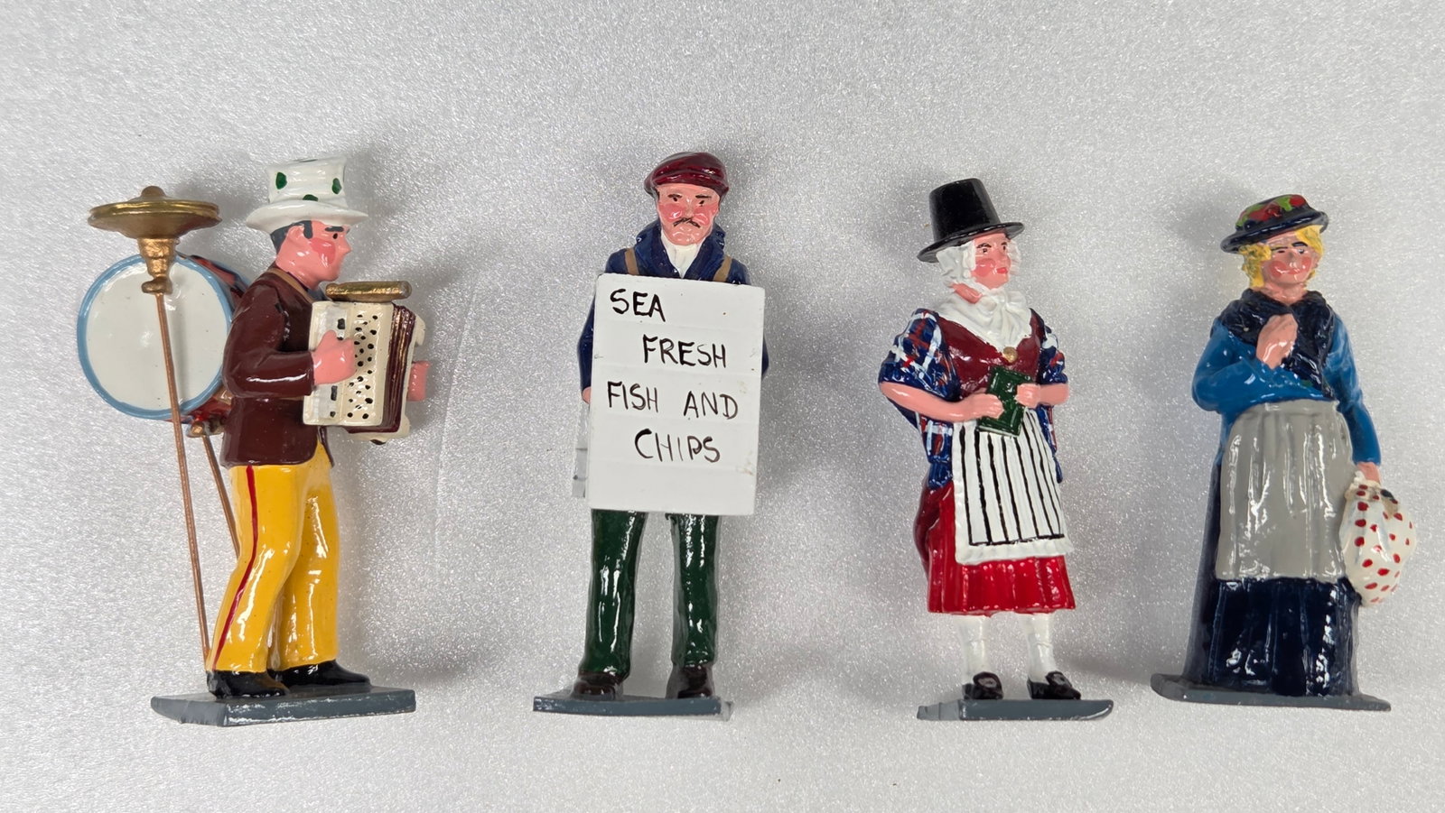 4) VARIOUS HAND PAINTED MERCHANTS CIVILIANS