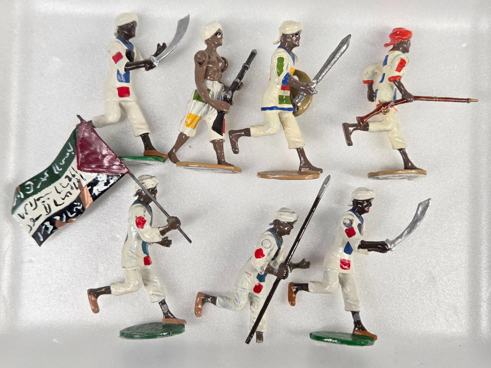 7) SUDANESE HAND PAINTED LEAD SOLDIERS (1 of 4)