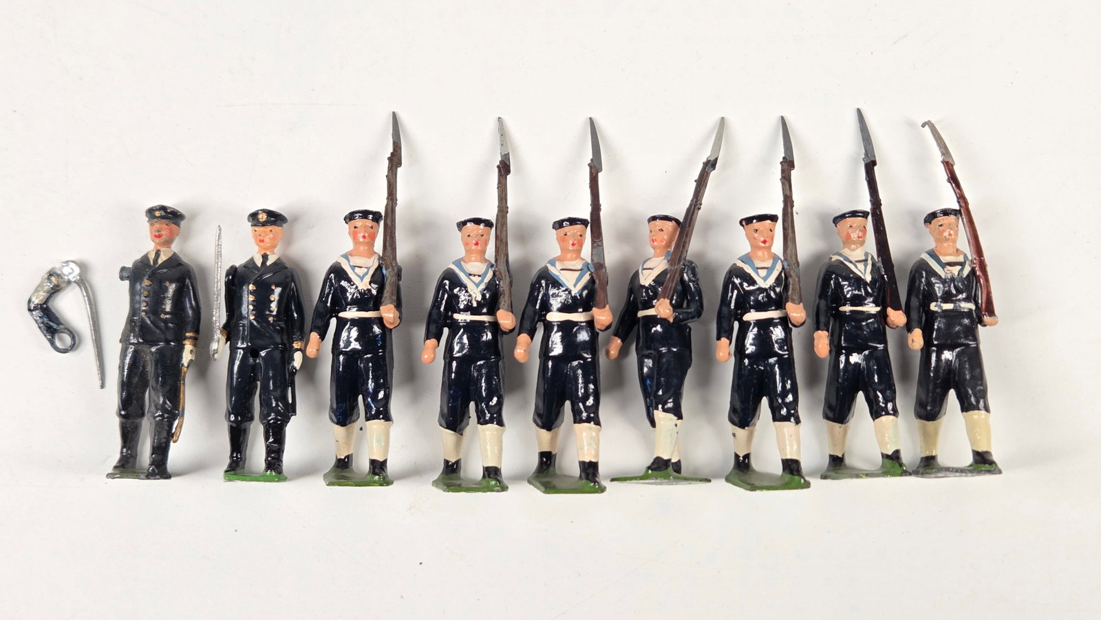 BRITAINS ROYAL NAVY LANDING PARTY W/ OFFICERS: ALL REMAIN IN GOOD CONDITION, SHOWING SOME TYPICAL WEAR - LOSS