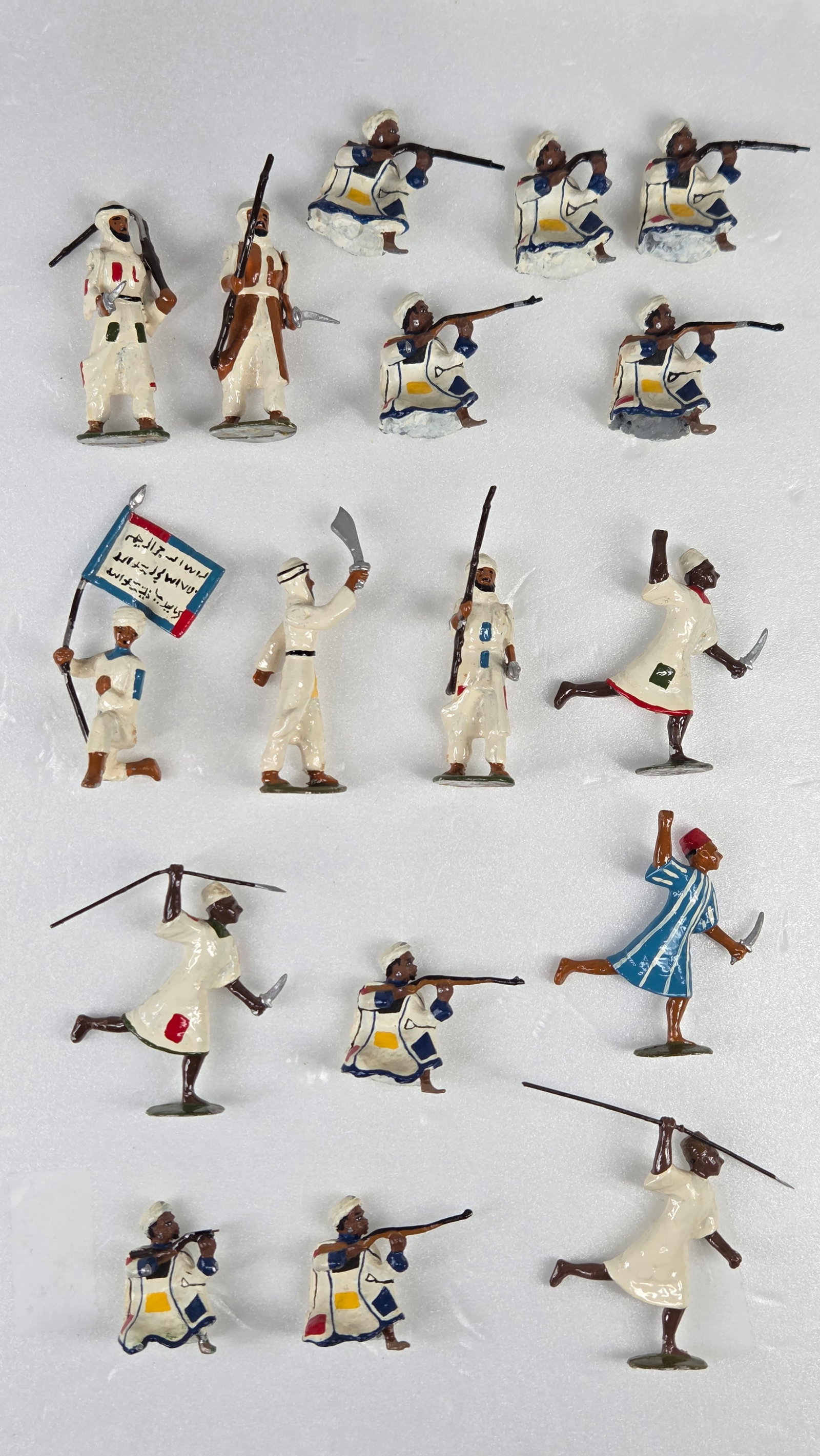 ASSORTED SUDANESE HAND PAINTED LEAD SOLDIERS: ALL REMAIN IN GOOD CONDITION, SHOWING SOME TYPICAL WEAR