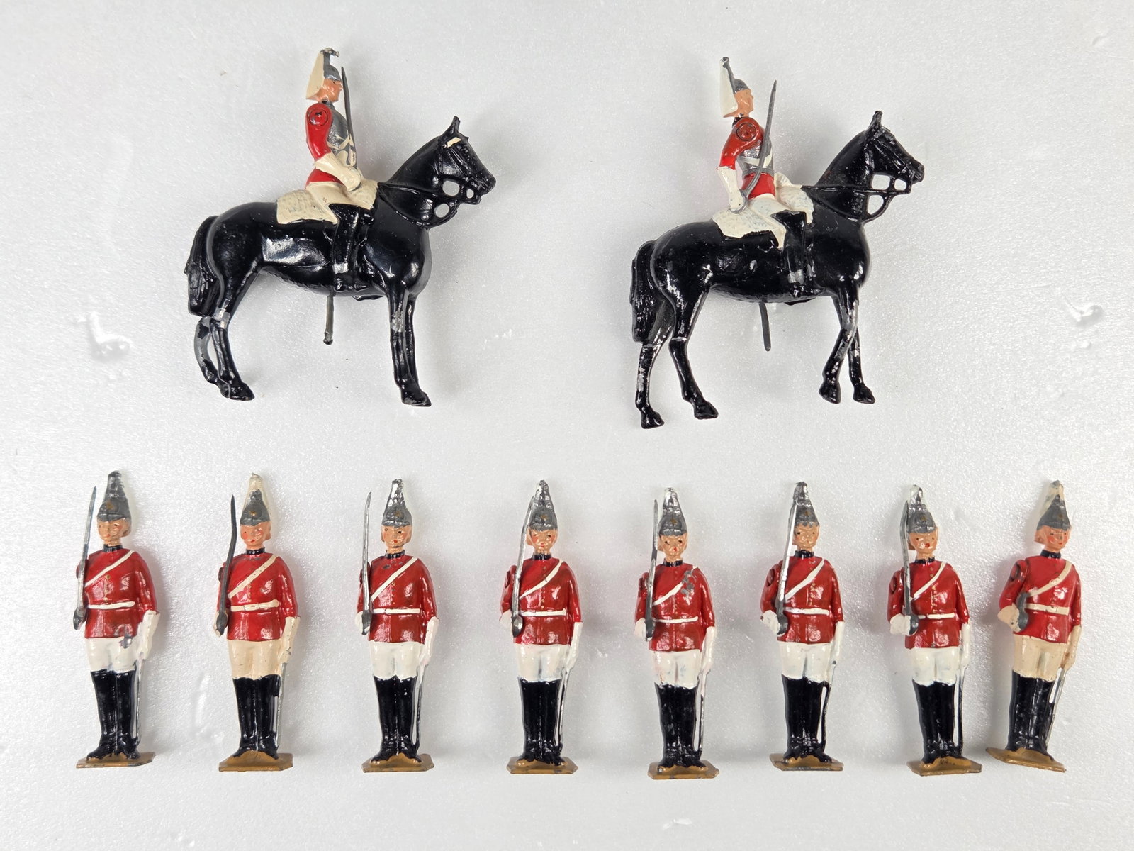 BRITAINS PAINTED LEAD SOLDIERS LIFE GUARDS: ALL REMAIN IN VERY GOOD CONDITION, SHOWING SOME TYPICAL WEAR