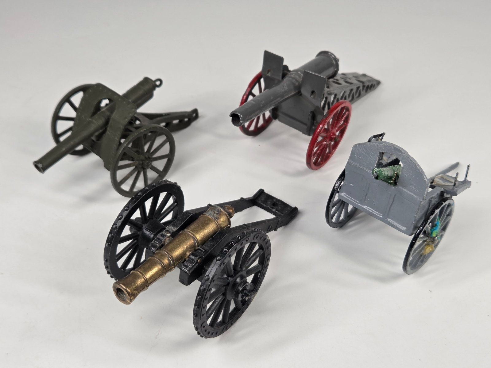 4) ASSORTED PAINTED LEAD ARTILLERY CANNONS (1 of 3)