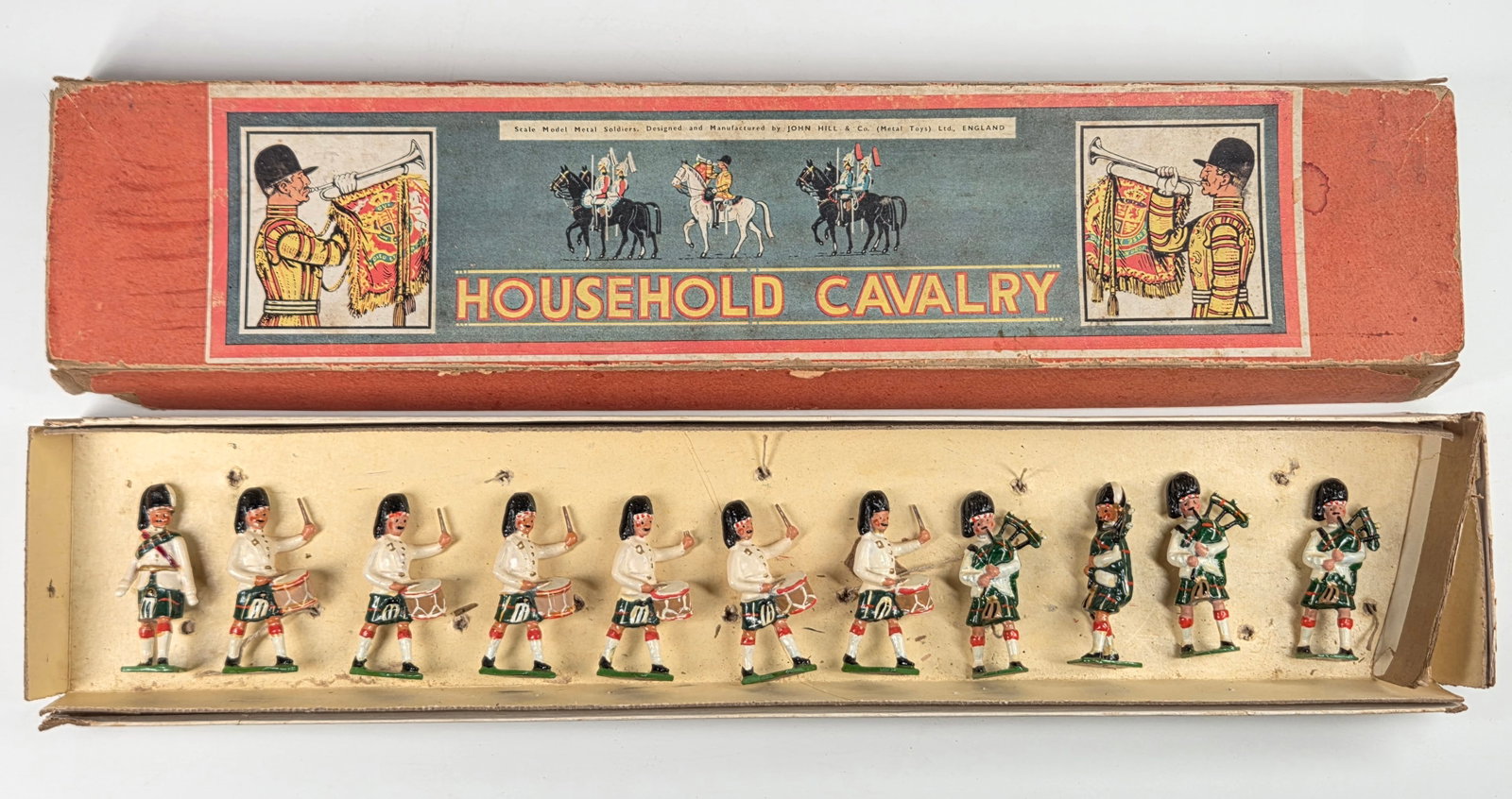 11) JOHILLCO PAINTED LEAD SCOTTISH MARCHING BAND: SET REMAINS IN GOOD CONDITION, SHOWING SOME TYPICAL PAINT / USAGE WEAR. IN BOX, WORN.