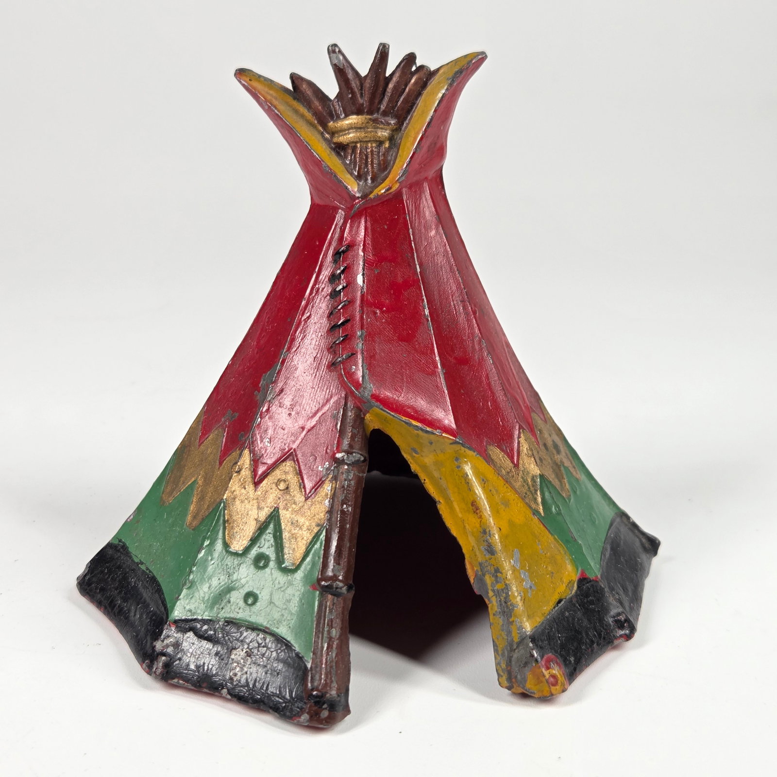 NATIVE AMERICAN TEEPEE PAINTED CAST METAL FRANCE: REMAINS IN GOOD CONDITION, SHOWING SOME TYPICAL PAINT / USAGE WEAR