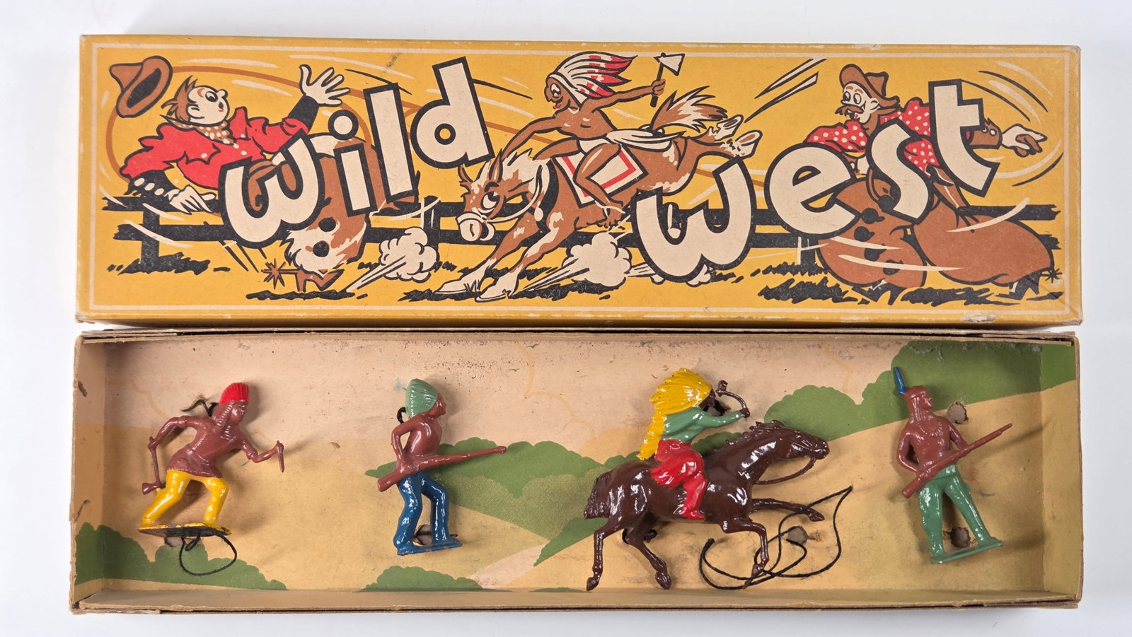 4) BRITAINS WILD WEST INDIANS 164S MOUNTED ON FOOT: SECONDS SET REMAINS IN GOOD CONDITION SHOWING SOME TYPICAL PAINT / USAGE WEAR. IN BOX