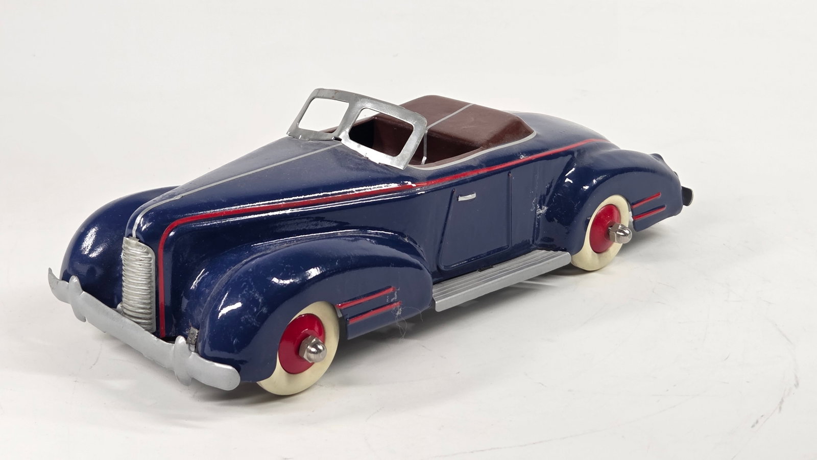 RESTORED MARX WYANDOTTE PRESSED STEEL CONVERTIBLE: REMAINS IN GOOD RESTORED CONDITION, SHOWING SOME LIGHT TYPICAL WEAR.