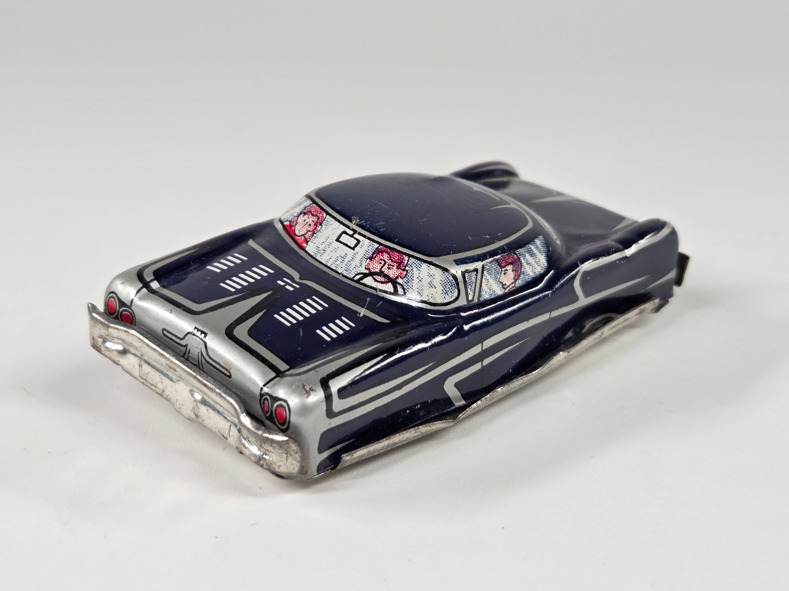 SMALL JAPAN TIN FRICTION FUTURISTIC CADILLAC - BLUE: REMAINS IN GOOD CONDITION, SHOWING SOME TYPICAL WEAR. FRICTION MOTOR WORKS.