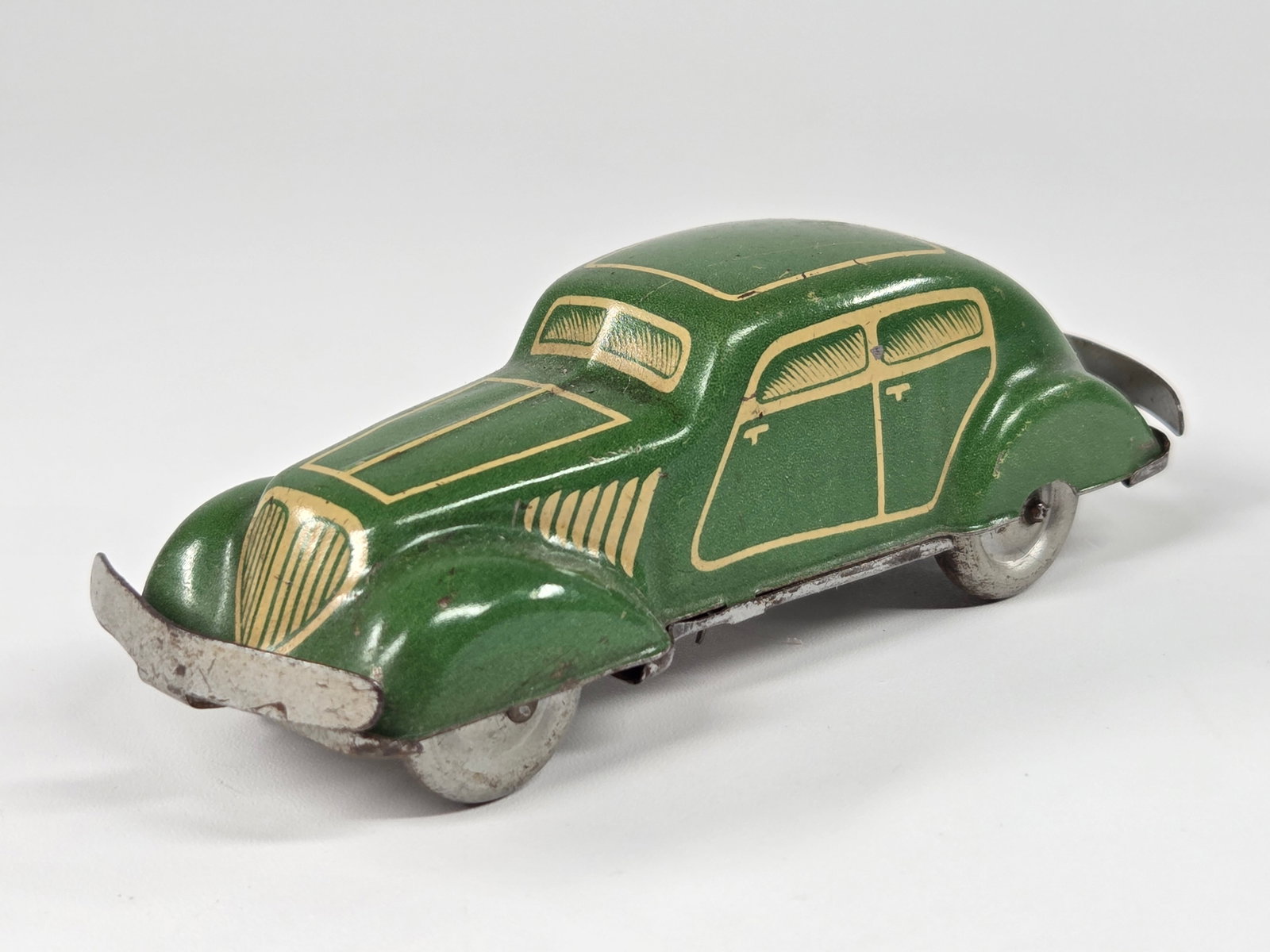 US ZONE GERMANY TIN LITHO WIND UP CAR - GREEN: REMAINS IN GOOD CONDITION, SHOWING SOME TYPICAL WEAR. UNTESTED.