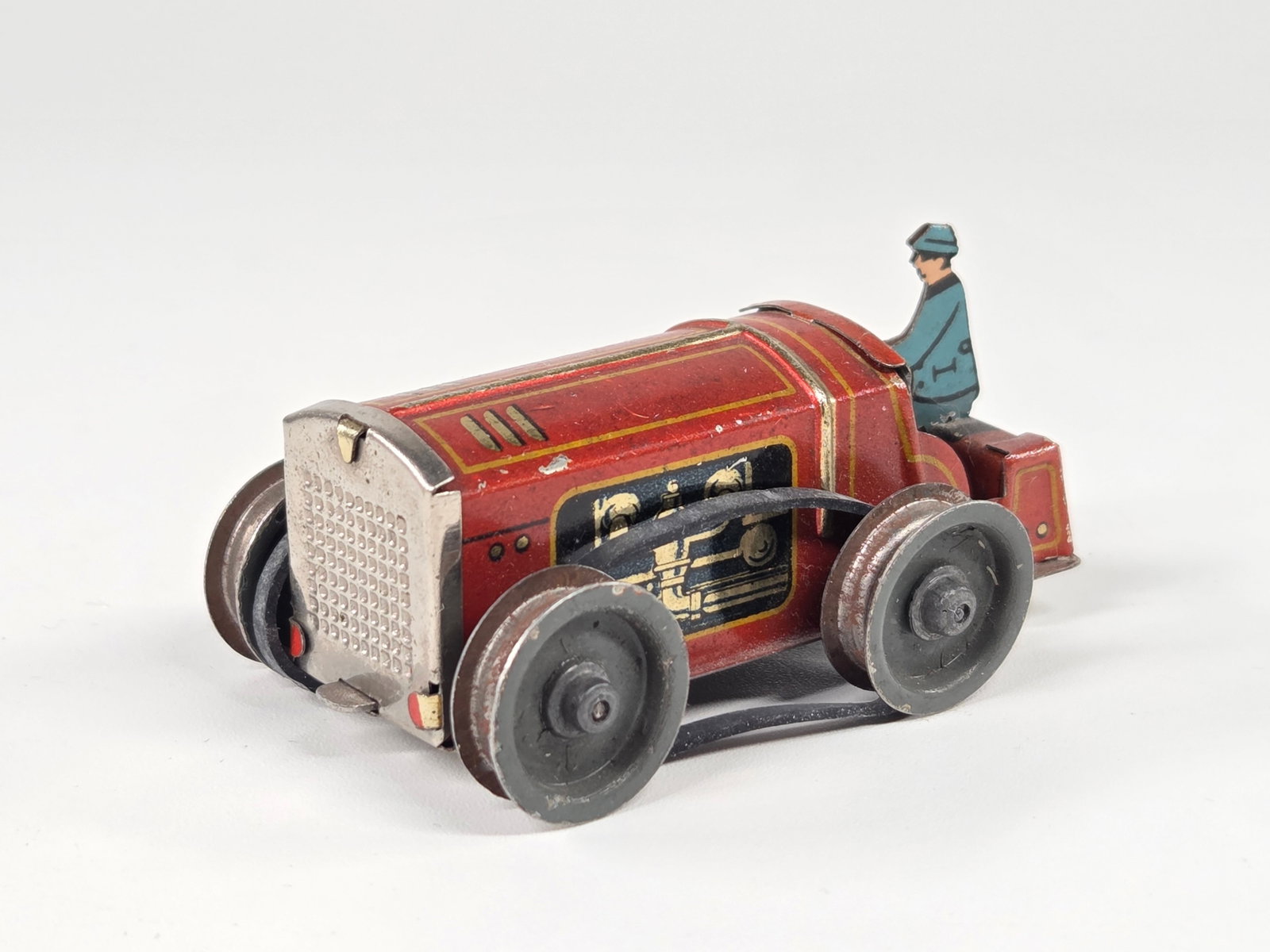 SMALL GERMAN TIN LITHO WIND UP TRACTOR PENNY TOY STYLE: REMAINS IN GOOD CONDITION, SHOWING SOME LIGHT TYPICAL WEAR. WIND UP MECHANISM WORKS.