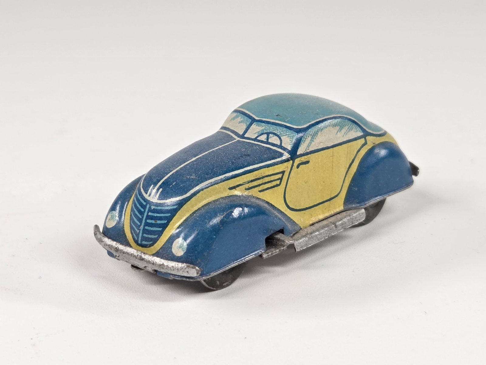 US ZONE GERMANY TIN LITHO WIND UP CAR - BLUE: REMAINS IN GOOD CONDITION, SHOWING SOME TYPICAL WEAR. UNTESTED.