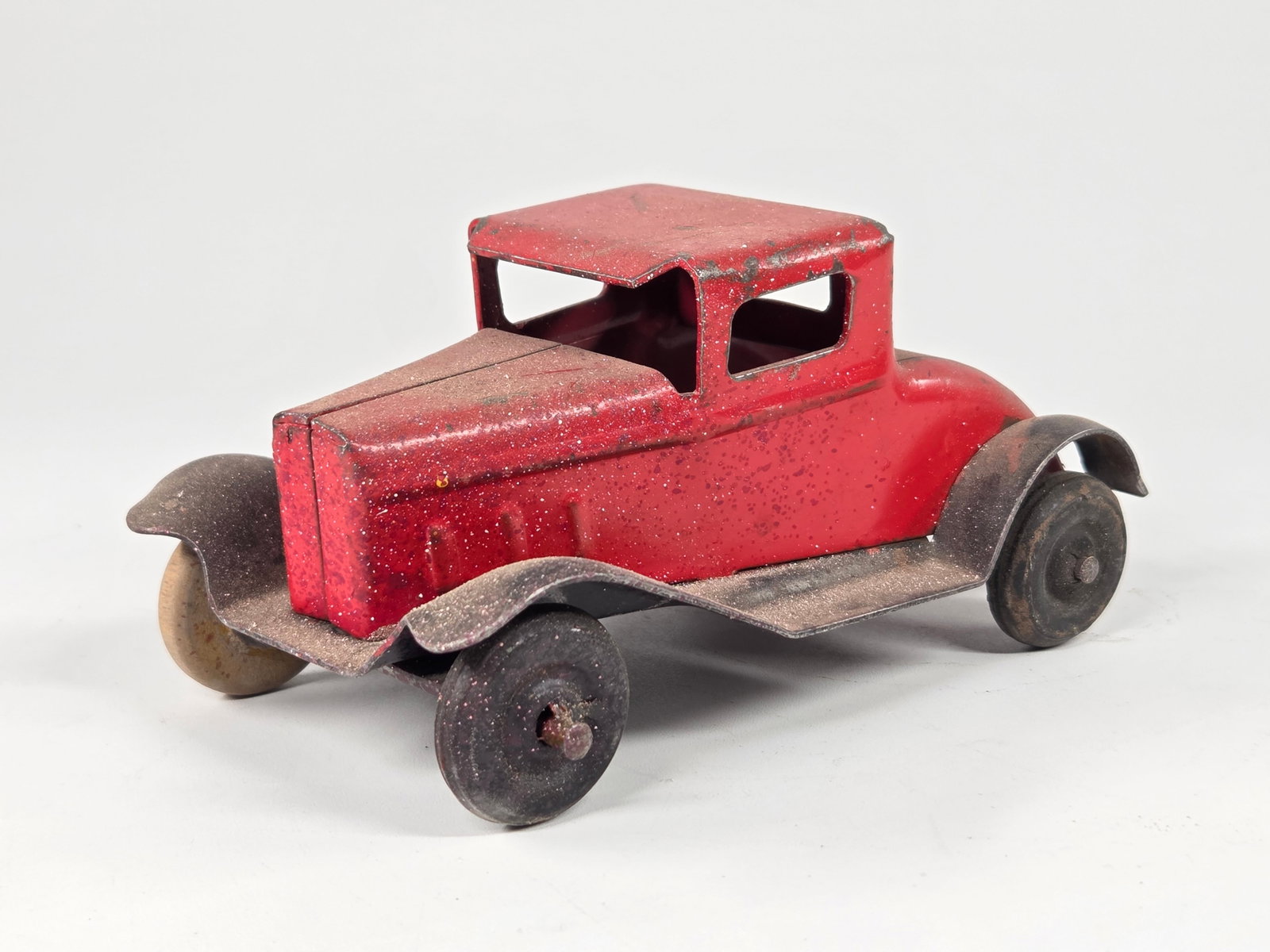 MARX PRESSED STEEL COUPE: REMAINS IN FAIR TO GOOD CONDITION, SHOWING TYPICAL USAGE WEAR THROUGHOUT.