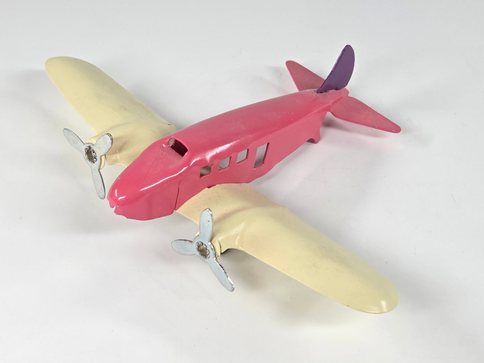 CUSTOM PAINTED RESTORED WYANDOTTE AIRPLANE: REMAINS IN GOOD RESTORED CONDITION. MISSING REAR WHEEL.