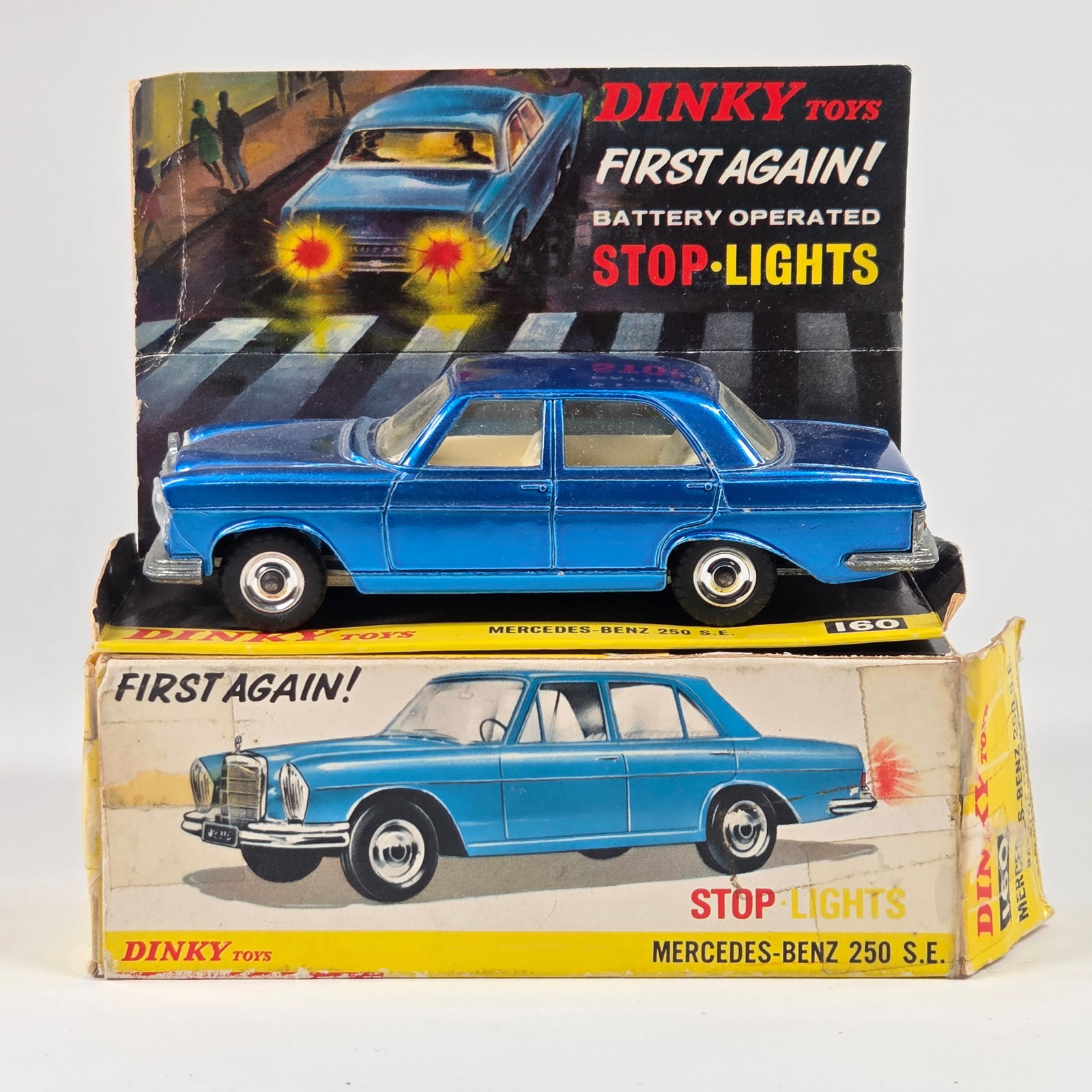 DINKY TOYS 160 MERCEDES BENZ 250SE W/ BOX: REMAINS IN VERY GOOD CLEAN CONDITION, SHOWING LIGHT WEAR. BOX SHOWING WEAR WITH TEARS AND TAPE APPLIED.