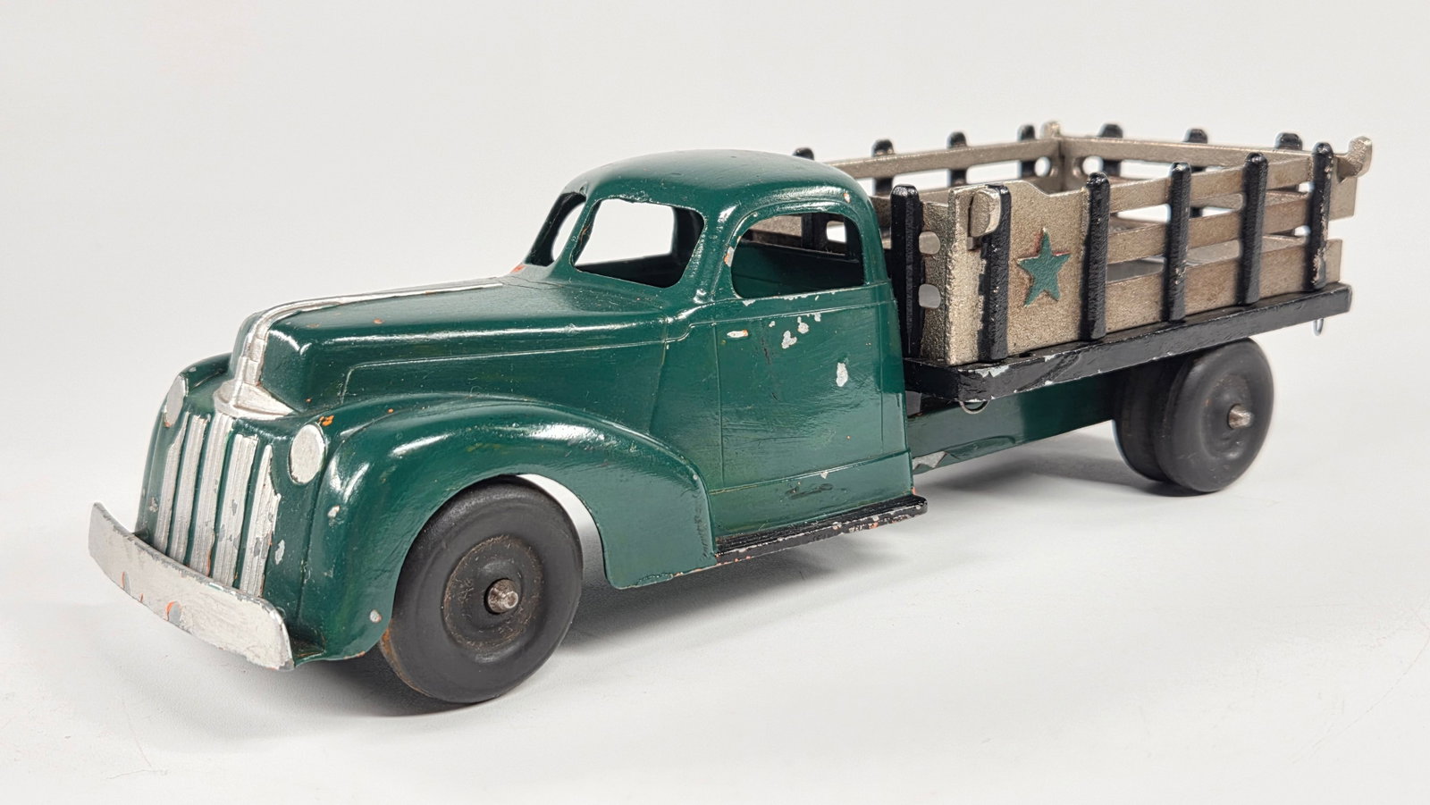 REPAINTED HUBLEY STAKE BODY TRUCK: TRUCK COMPLETELY REPAINTED. SHOWING SOME PAINT WEAR.