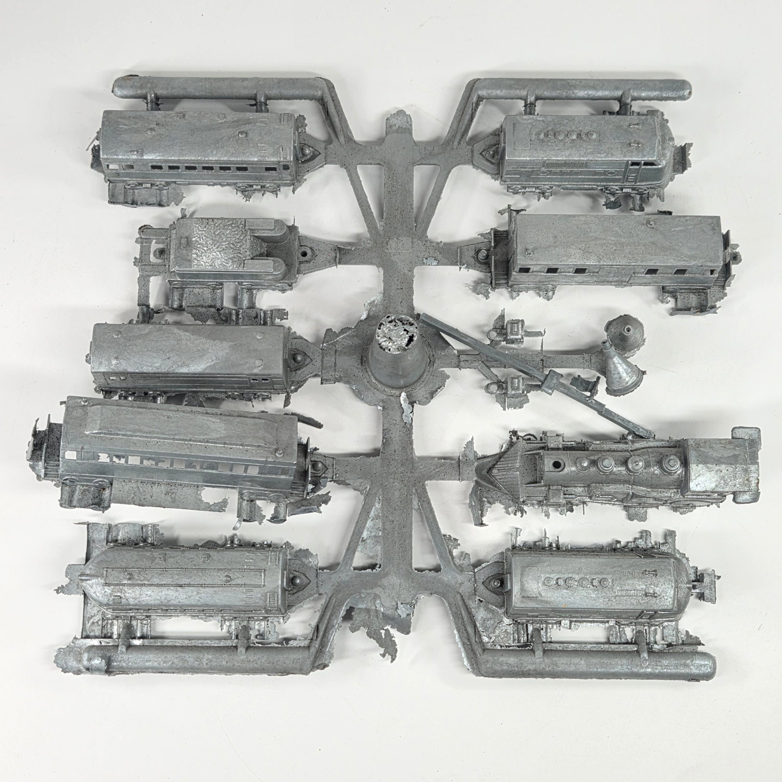VINTAGE MIDGETOY MOLDS ON METAL TREE