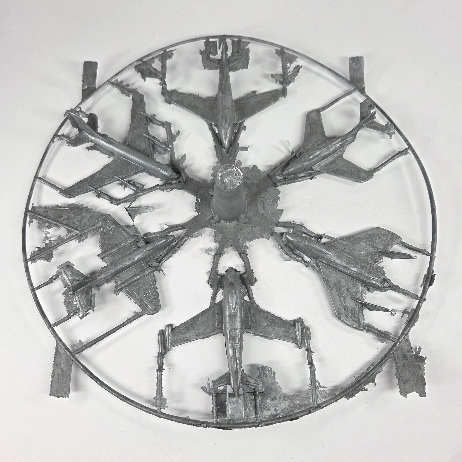 VINTAGE MIDGETOY MOLDS ON METAL TREE: REMAINS IN FAIR TO GOOD CONDITION, SHOWING SOME TYPICAL WEAR.